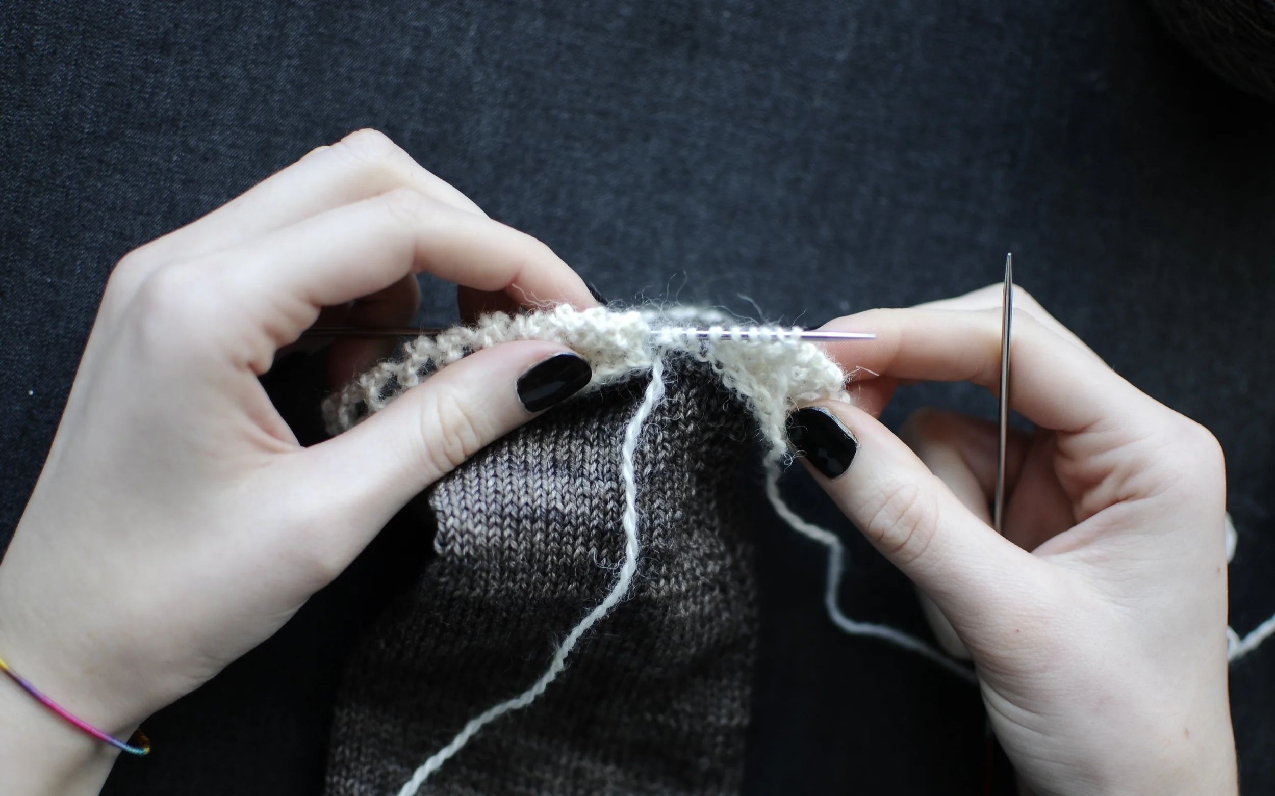 13. Continue to work Rows 1 - 4 until there is one cuff stitch remaining. Work Rows 1 - 3 once more. 