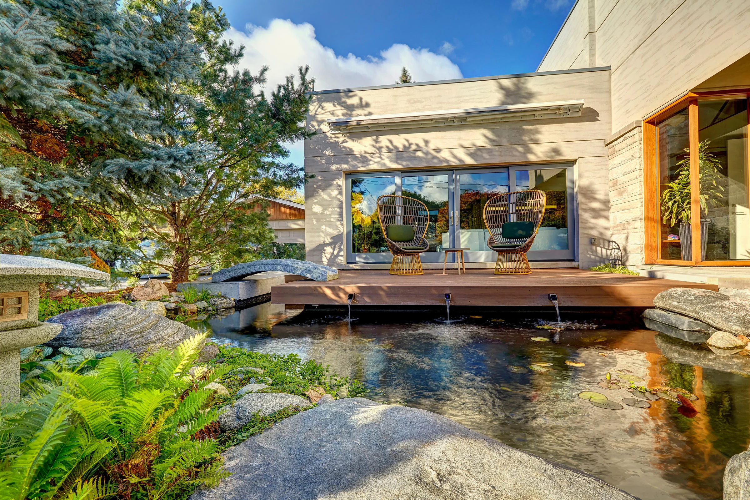 The wood viewing deck allows for views into and out of the home.