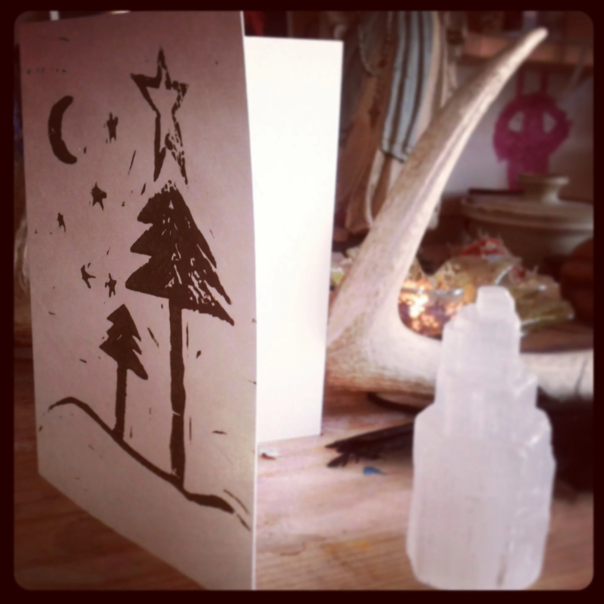 a winter solstice wood block print with selenite tower.