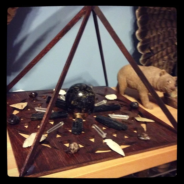 Bear medicine grid with black tourmaline and garnet sphere, garnet, black tourmaline, and white arrowheads