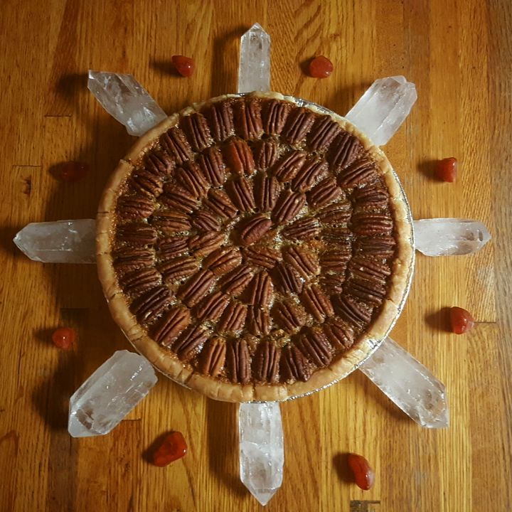  I love to Reiki and grid my food before serving it. This is a pecan pie I baked for Thanksgiving, gridded with Clear Quartz and Carnelian. 