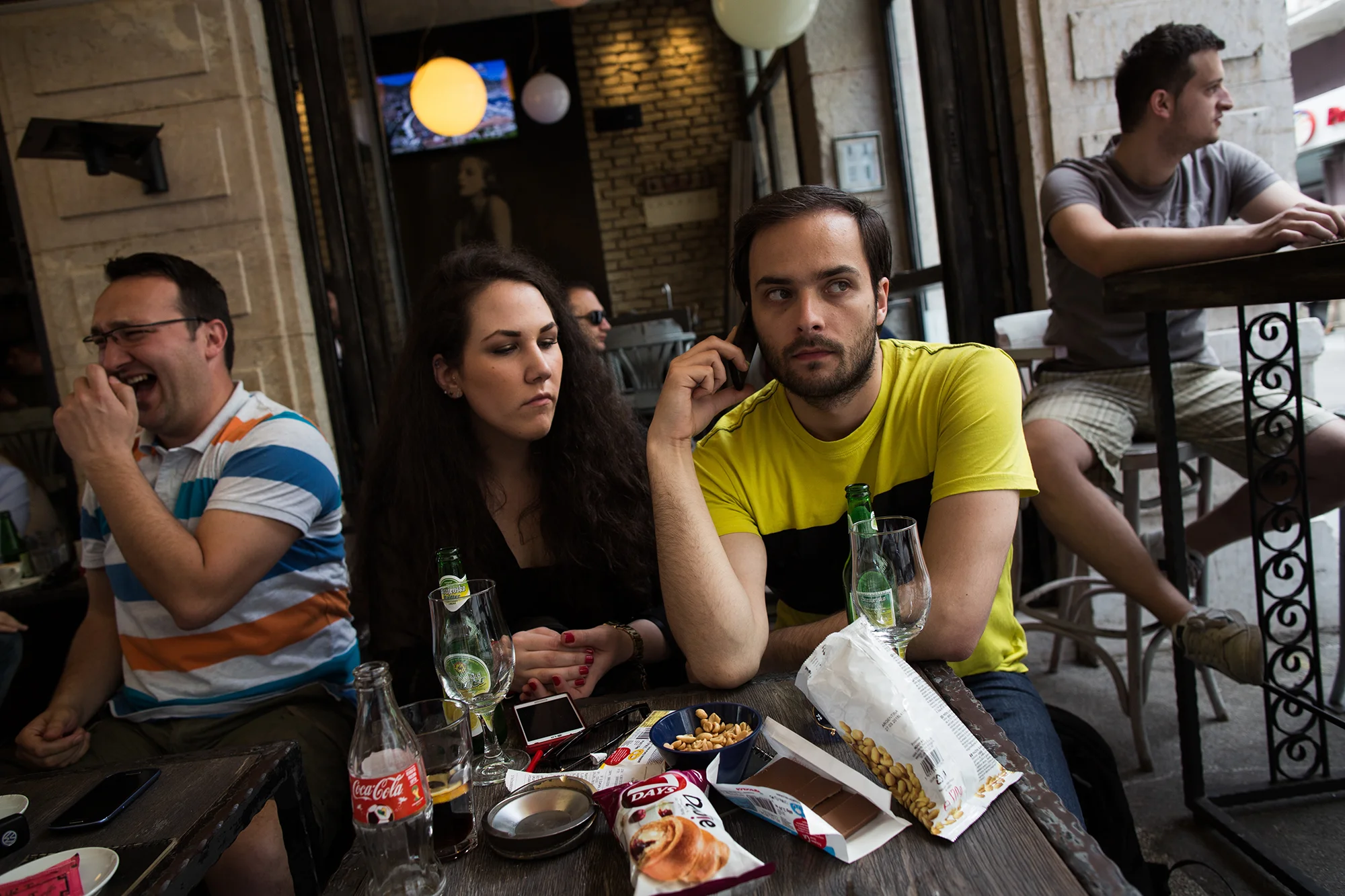 Renata Mostarac, a Bosnian of mixed descent, meets up with her friend Dalibor Perkovic for coffee. Renata is 23-years old and has been unemployed since finishing her Masters degree in the political science branch of public relations at the University of Sarajevo in December, despite applying for numerous jobs. She lives with her mother and father in central Sarajevo, in the same house that they lived in throughout most of the war.