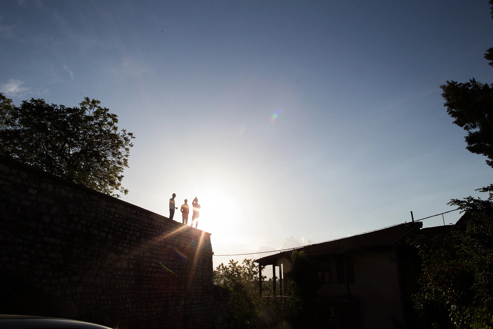 Youth gather to watch the sunset in Sarajevo.