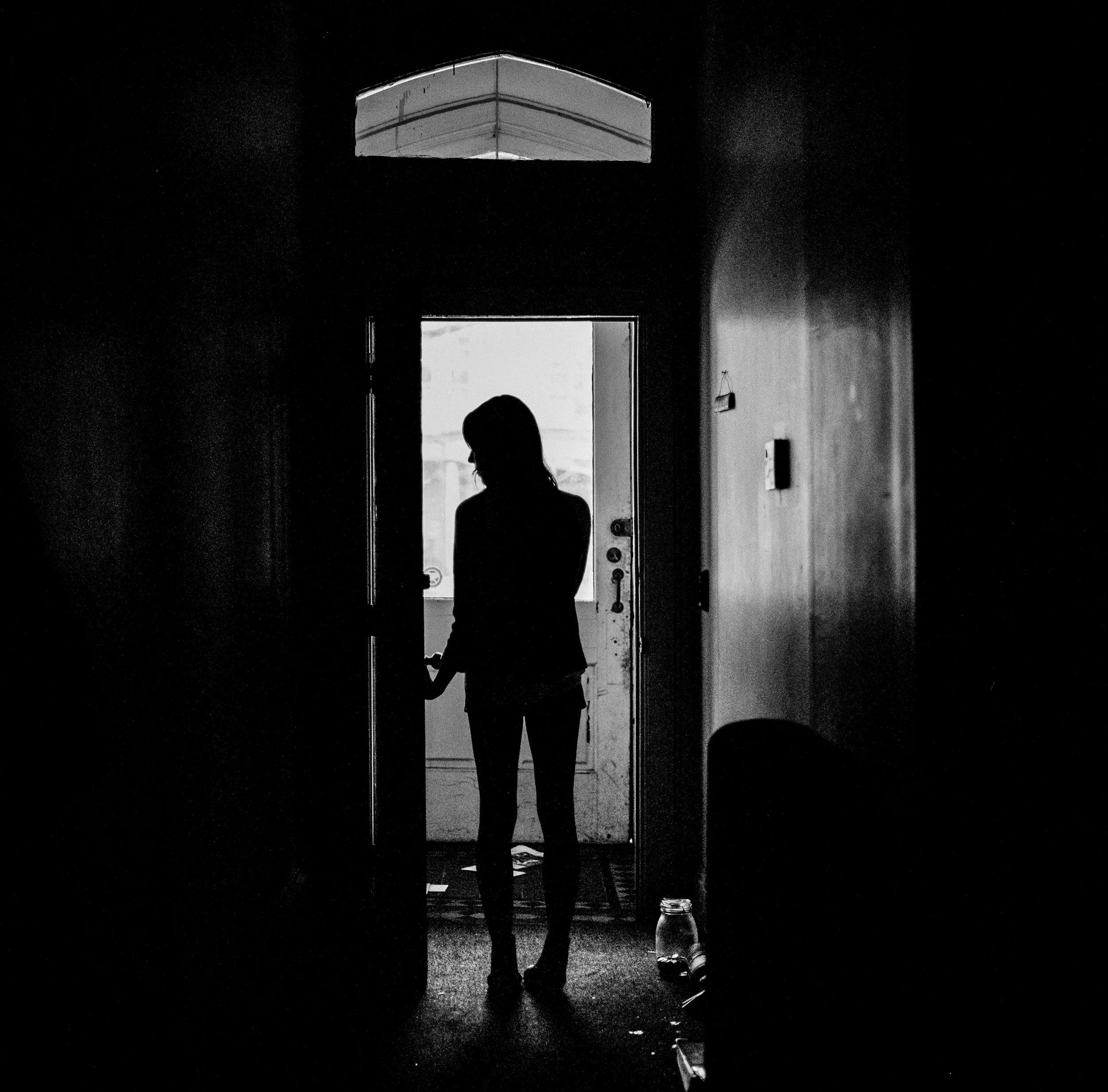 Catherine, a Penn senior who withheld her last name for privacy purposes, stands in the entryway of the house she shares with a number of other UPenn students. Catherine said she found hookups in college to be a continual source of heartbreak. She began dating a guy she met while studying abroad in Ireland, but they broke things off when she returned to the States; the experience did, however, make her a bit more hopeful for dating upon her return.