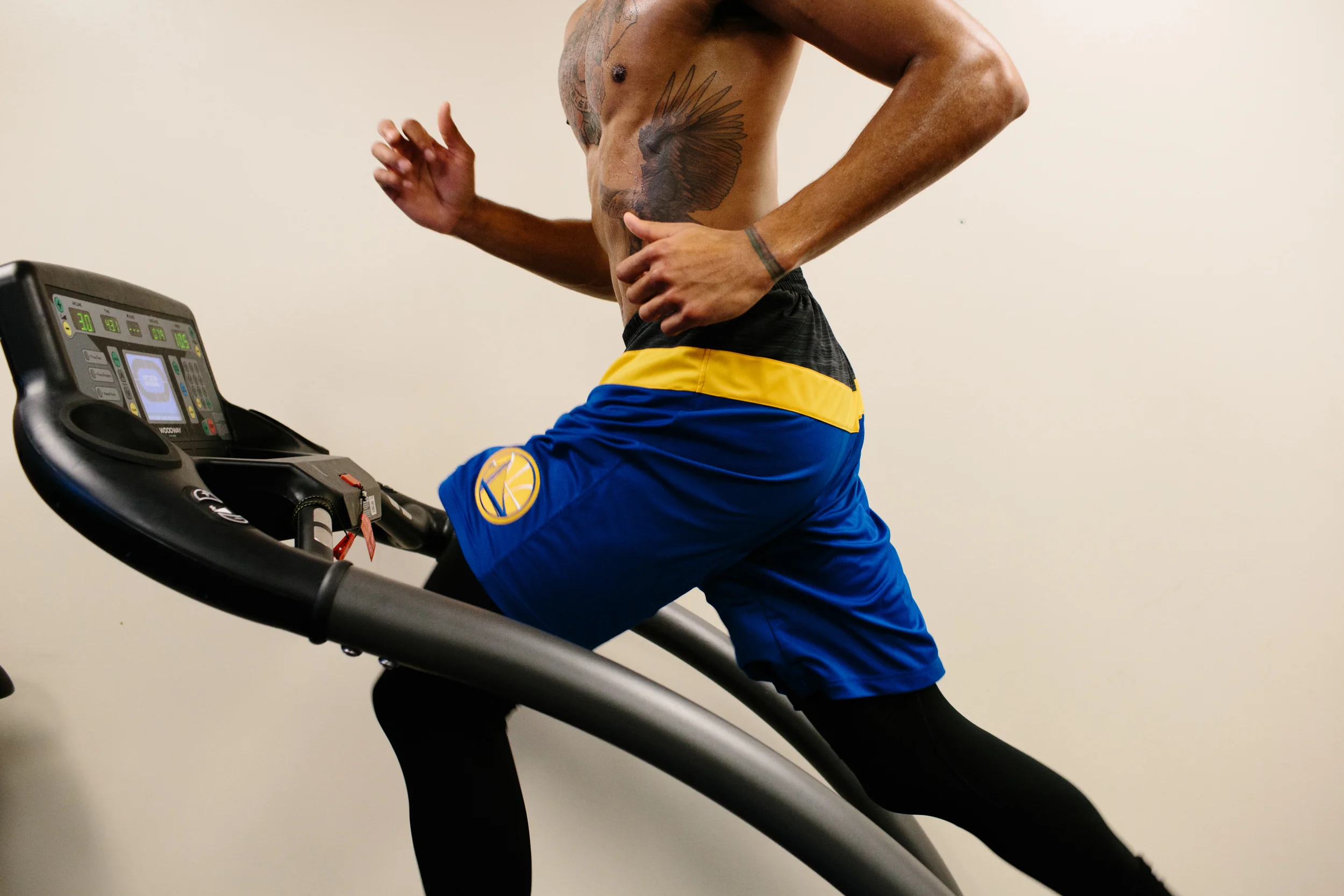 McAdoo does strength training and cardio in the locker room prior to a Warriors home game against the Cleveland Cavaliers.