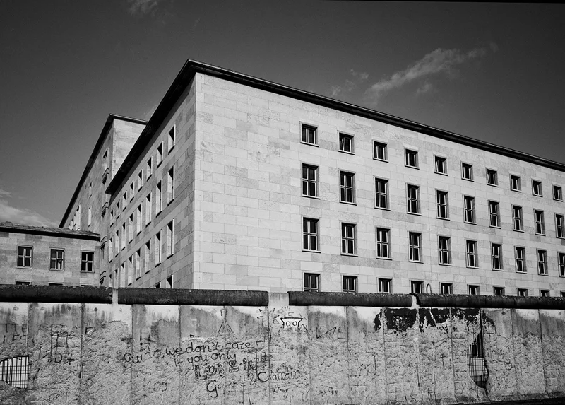 ESCAPE After a year and a half of planning, East German Heinz Holzapfel and his wife and nine-year-old son made their escape in July 1965 to the West over the Berlin Wall from the roof of the House of Ministries. Considered one of the more daring escape attempts over the Wall, Holzapfel used a device constructed from a hammer, nylon cord and bicycle wheel to slide his family to safety.
