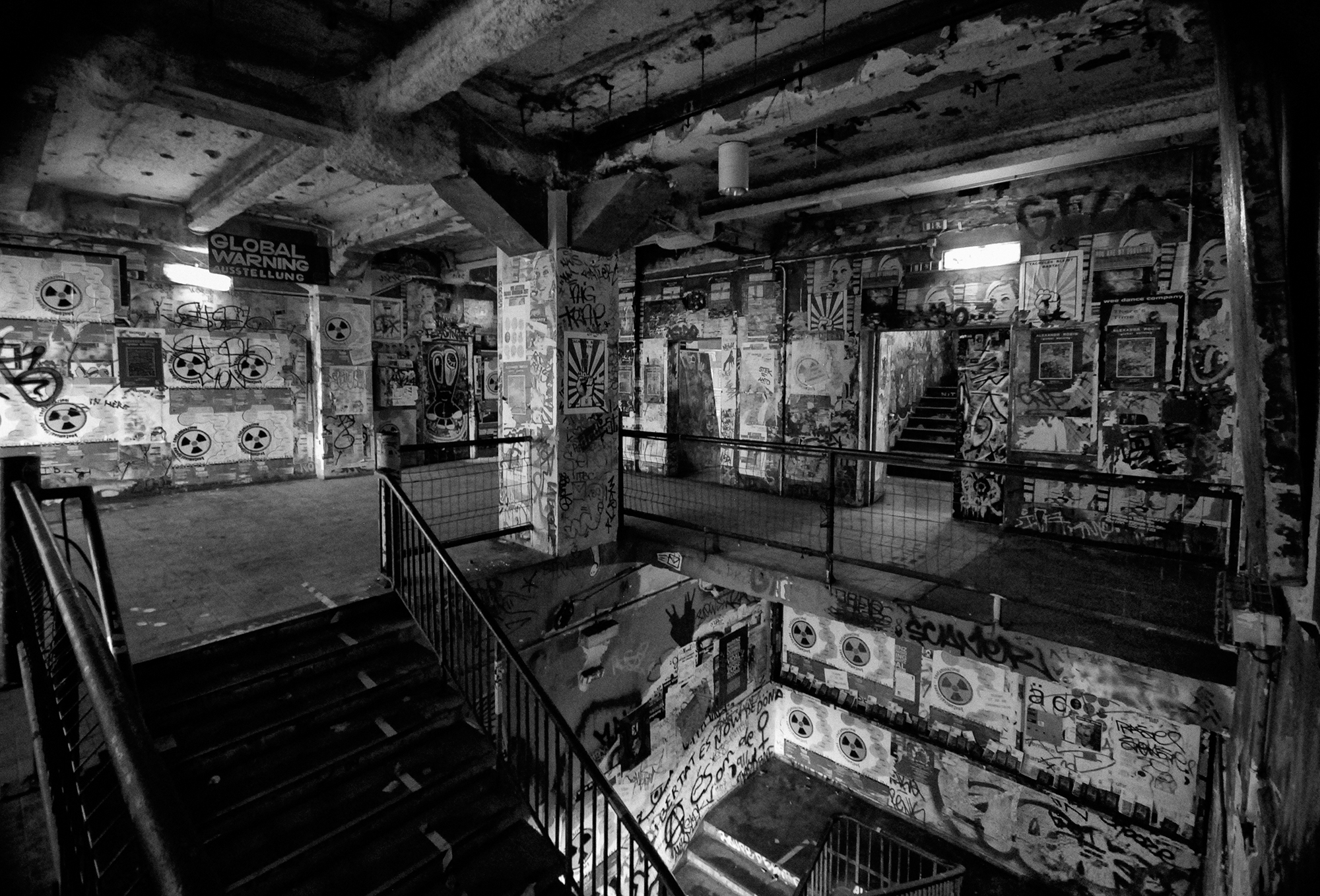 TACHELES The Kunsthaus Tacheles building on the former east side of Berlin dates back to the early 1900s and has allegedly been home to Nazi SS offices, prisoners of war and a communist army barracks. The graffiti-scarred building was set to be demolished in 1990, but it was spared after artists took residence. Tacheles is considered part of the Greenwich Village of Berlin, housing several artists’ studios inside and outside in a courtyard strewn with shacks and sculptures.