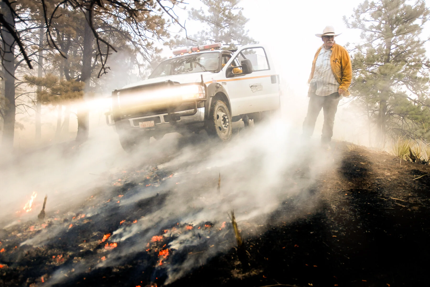  A rancher observes the aftermath of a forest fire in Eastern Montana. 