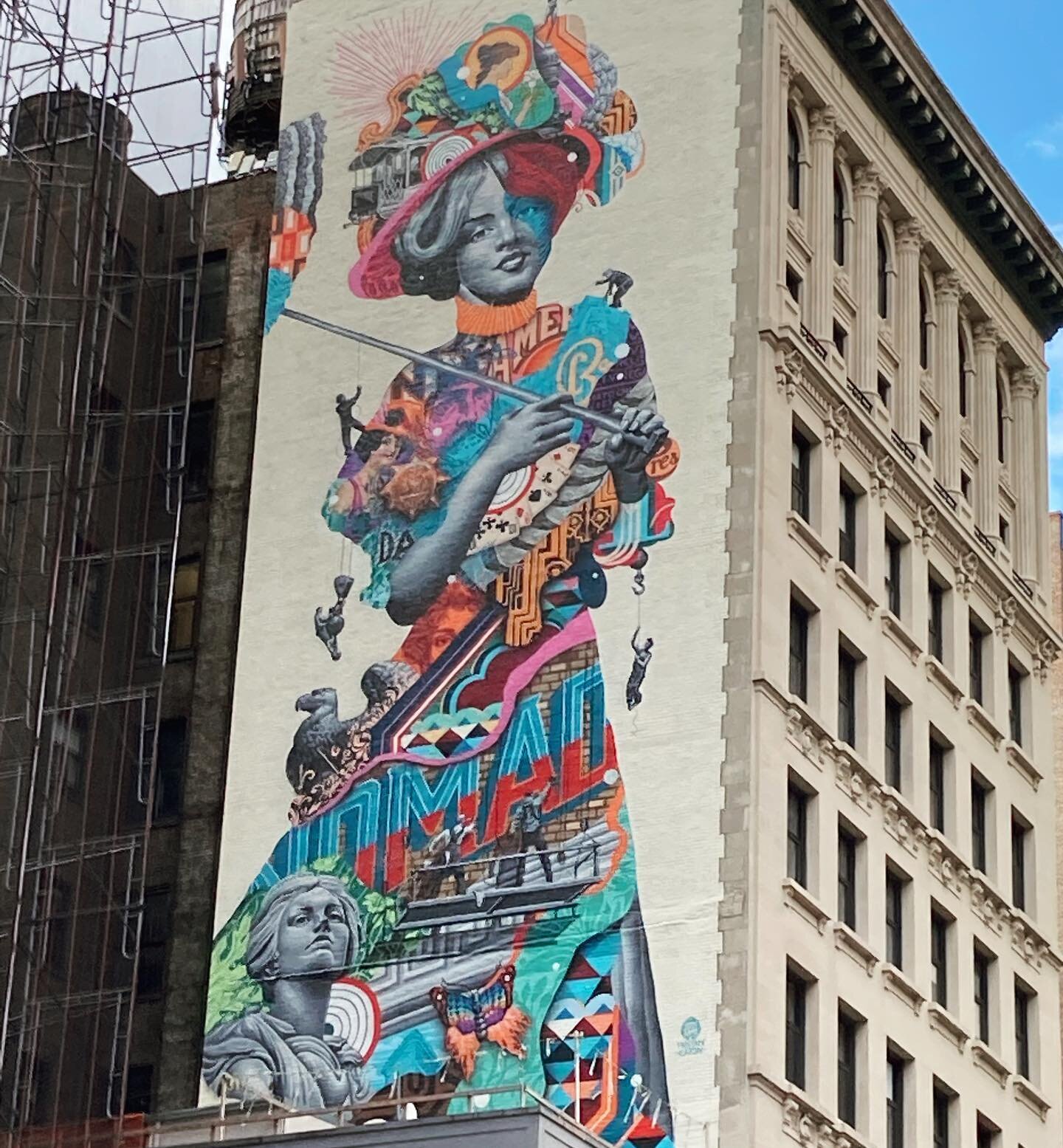 Very into this giant mural by @tristaneaton on Madison Ave. A jigsaw puzzle of neighborhood history.