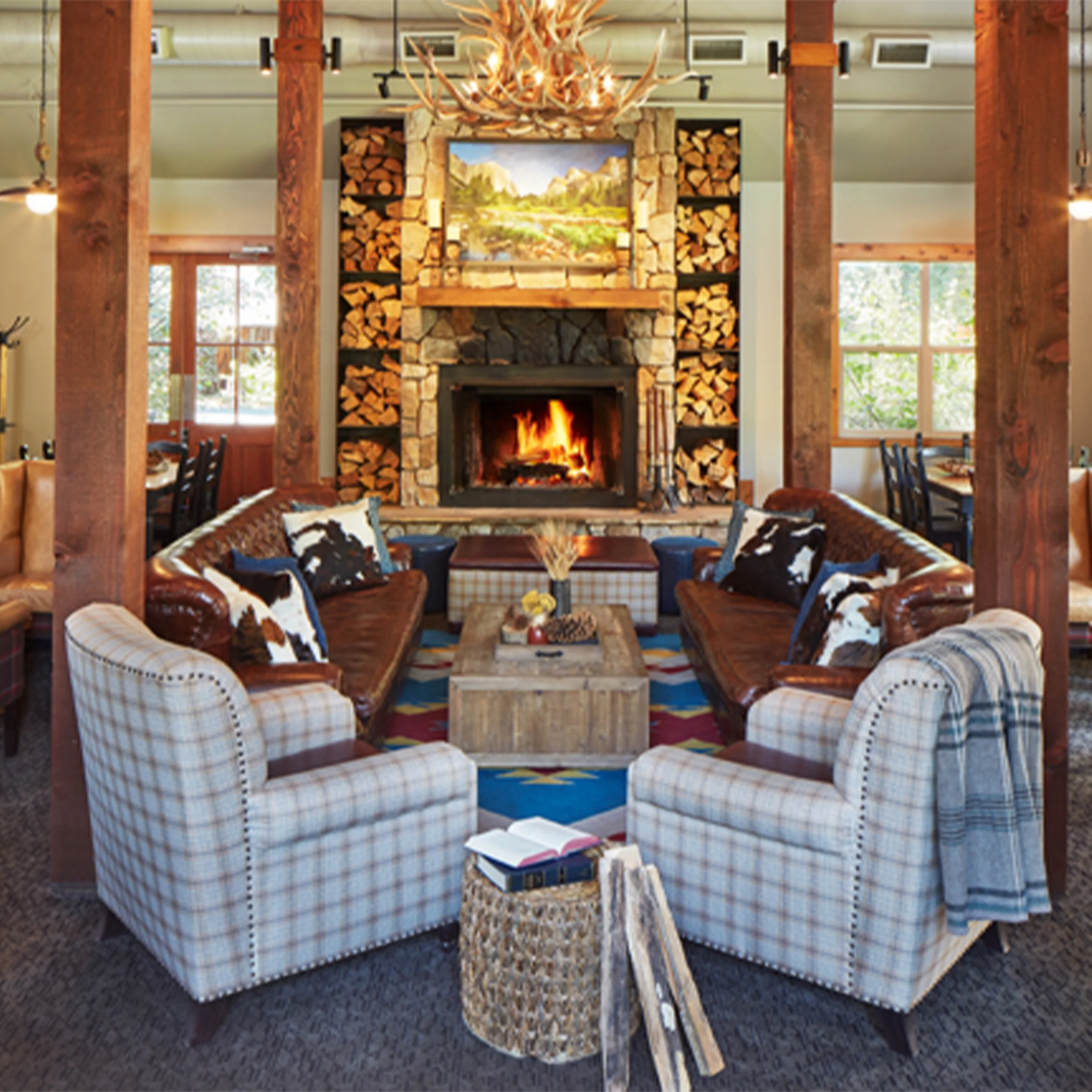 fireplace with antler pendant light