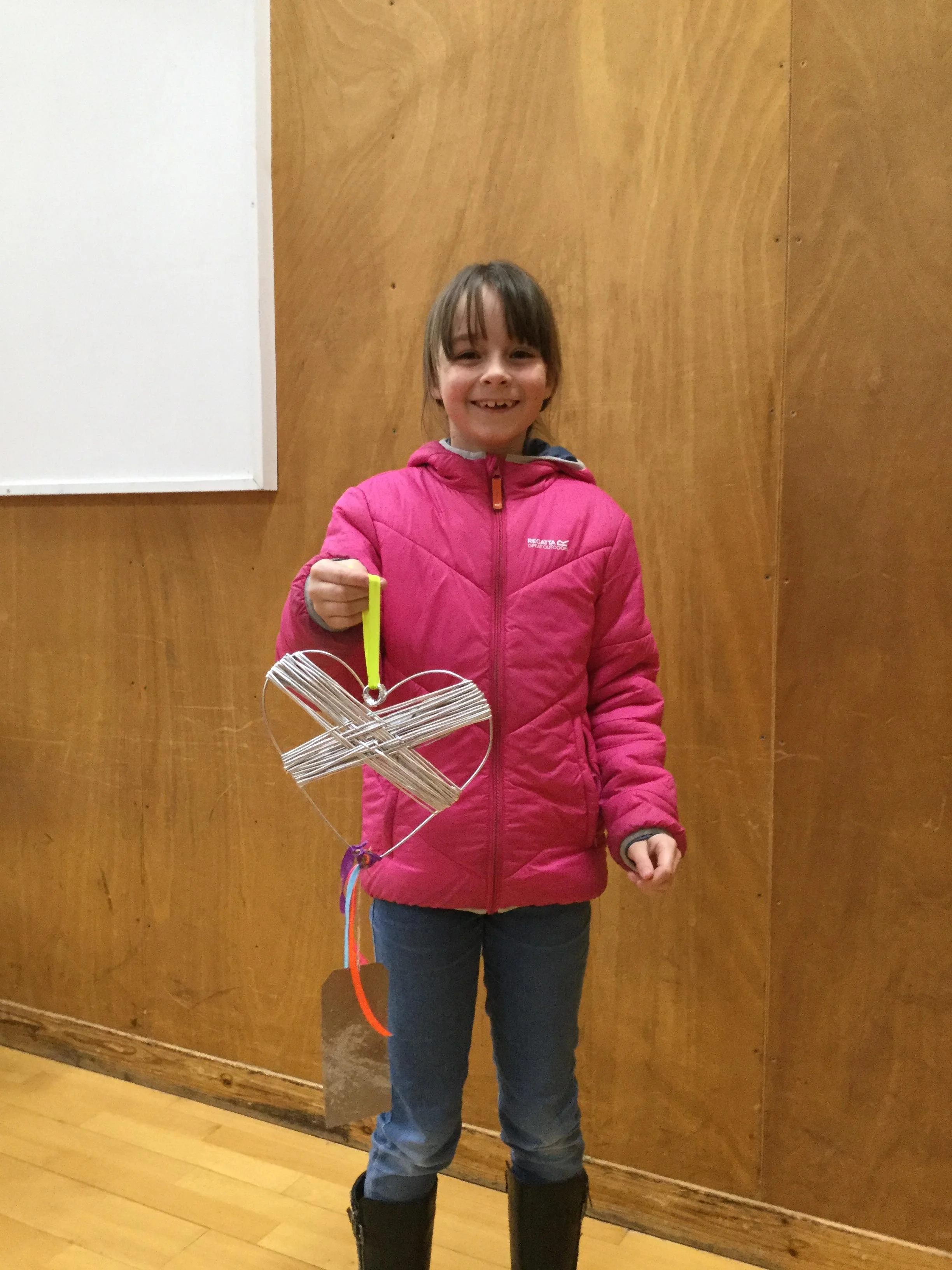 Participant with wire heart in the Islesburgh Community Centre in