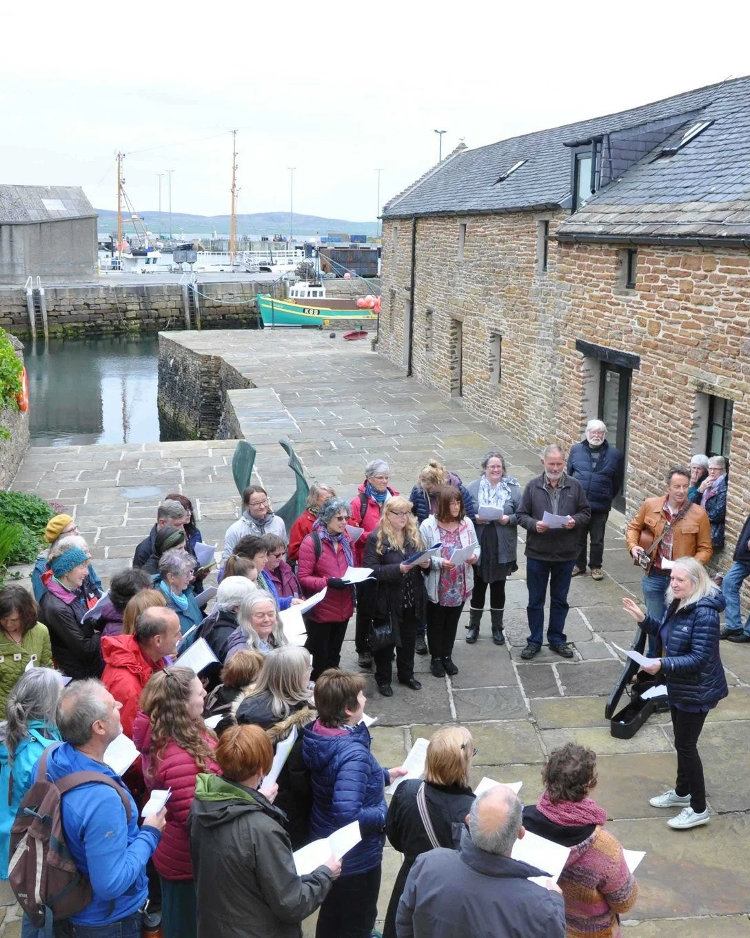 The @orkneyfolkfest  is in full swing and Stromness is buzzing! 

The Pier Arts Centre is open 10:30-5 Friday &amp; Saturday and 10:30-4 on Sunday.
Admission is Free

Image: Folk Festival Choir performing on our pier

#PierArtsCentre #OrkneyFolkFesti