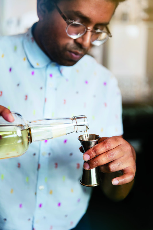  Award winning bartender and mixologist Ryan Chetiyawardana at Dandelyan Bar (now named Lyaness). London UK.  Whisky Advocate  Winter 2016. Photography by Julian Love.  