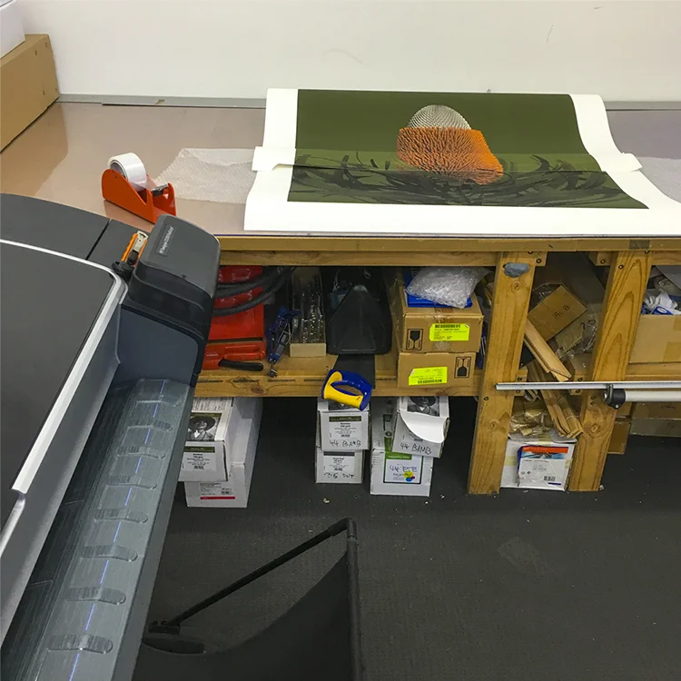 At the printers running through colour tests for the final print run.