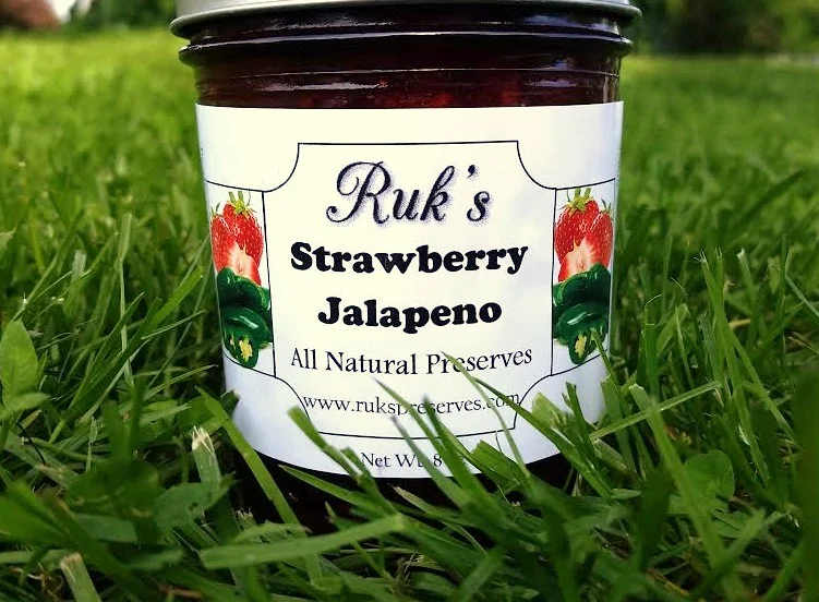 8 oz. Jar (January - December) Strawberry Jalapeno combines all of the wonderful sweetness of the fresh strawberries with the sneaky heat of the fresh, homegrown Jalapeno peppers making it the perfect sweet and spicy preserve. Ingredients: Strawberries, Sugar, Jalapenos, Pectin, Organic Lemon Juice