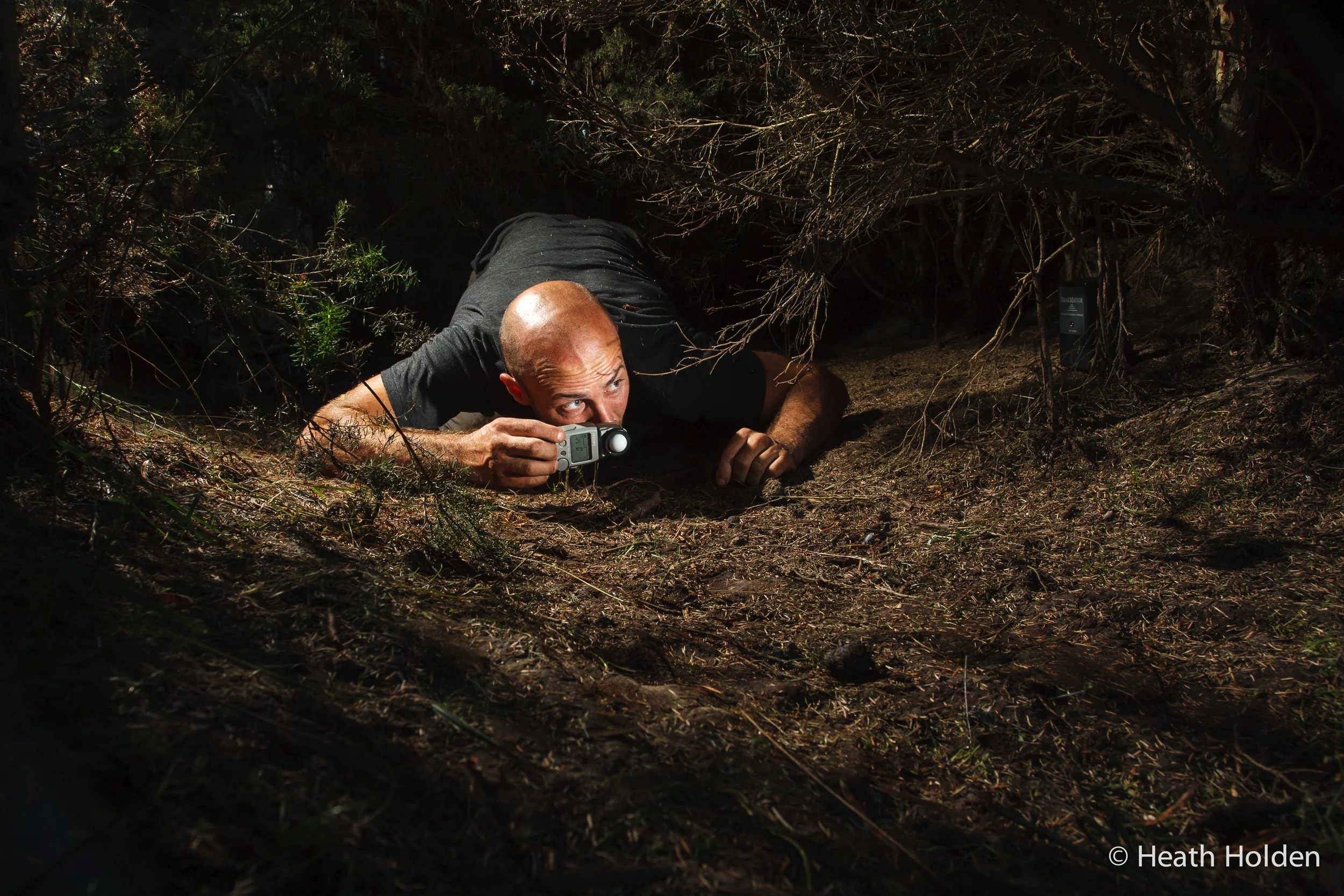 All flash power settings need to be dialled in manually, here is some guy metering the lights in the deep jungle at night. After camera trapping for a while you end up with a LOT of pictures of yourself.