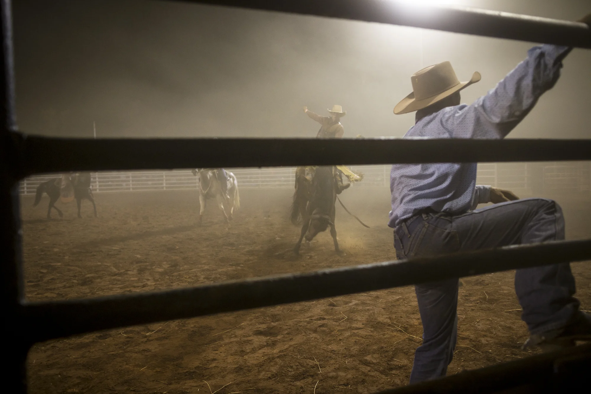 A bronco rider in the arena at the Tennant Creek rodeo.