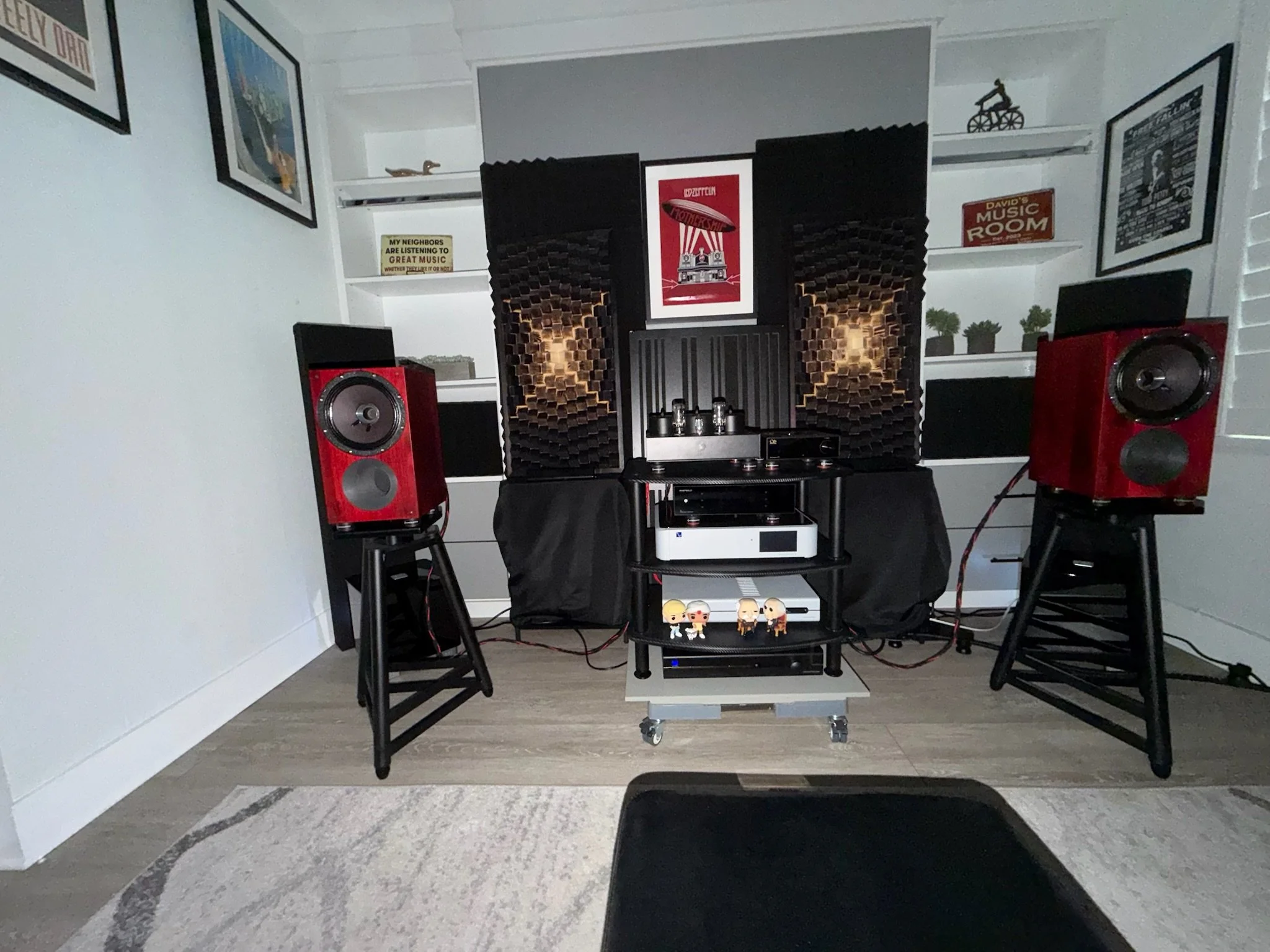 Ruby Red Hickory Method bookshelf speakers,
Monoprice 24” Easel stands,
Pine Tree Audio Earth Tones 6L6 SET tube amp,
Shanling ET3 CD Transport,
Eversolo T8 streaming transport,
PS Audio DirectStream MKI DAC,
PS Audio PowerPlant 3 conditioner,
Dual R