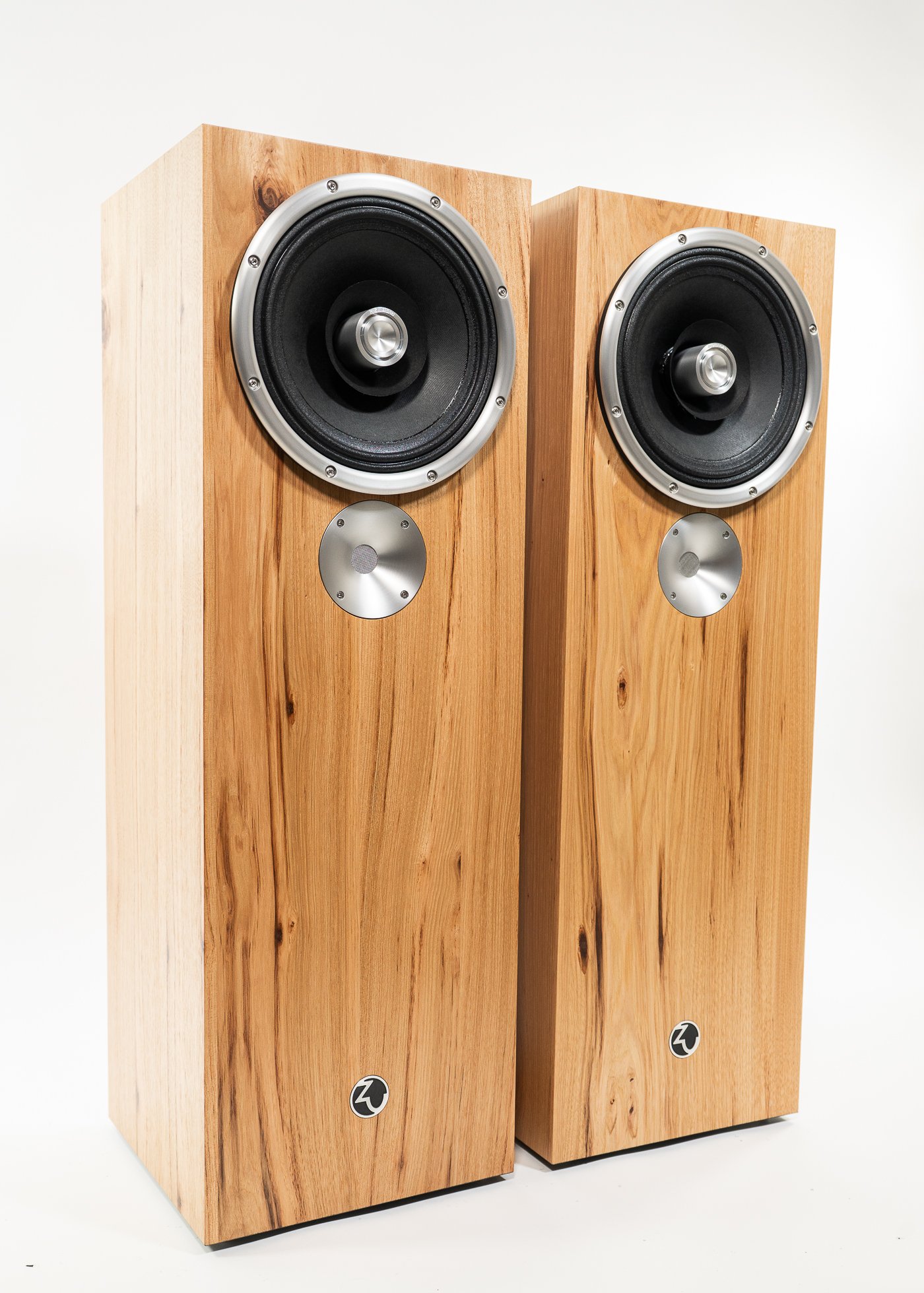 Isometric view photo of Zu DW-6 Superfly loudspeaker finished in semi-rustic hickory and silver trim - matched pair.