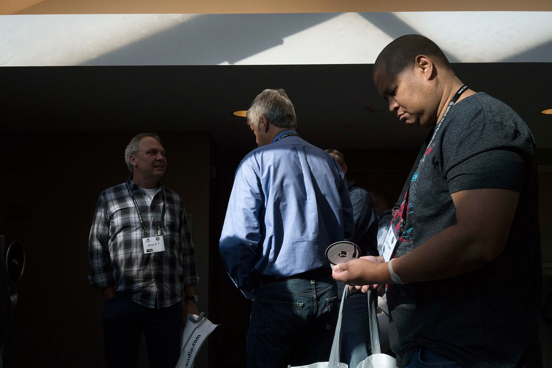 Kent English of Pass talking shop in the foyer.