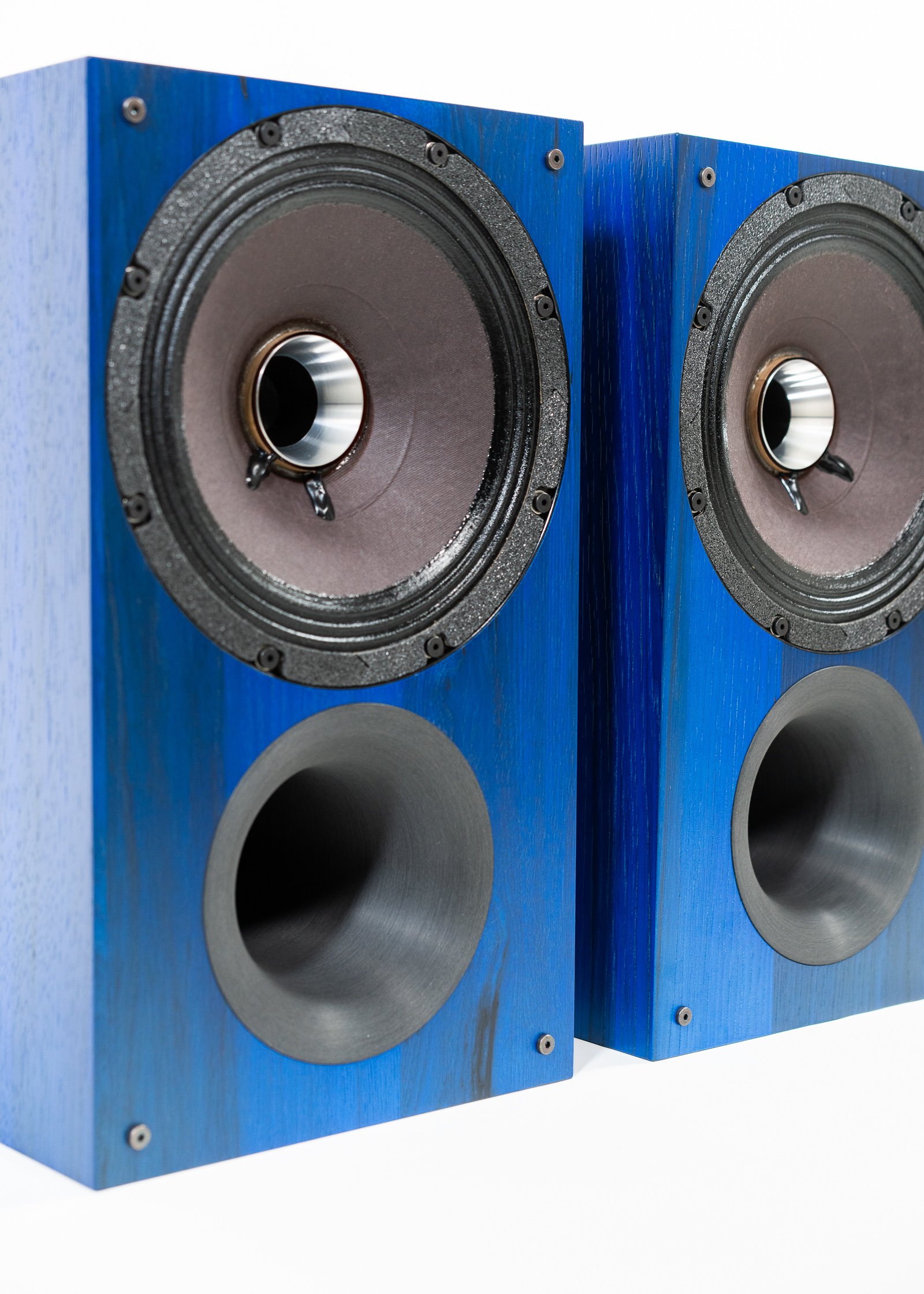 Closeup photo of Zu Audio Method Bookshelf finished in electric blue hickory.