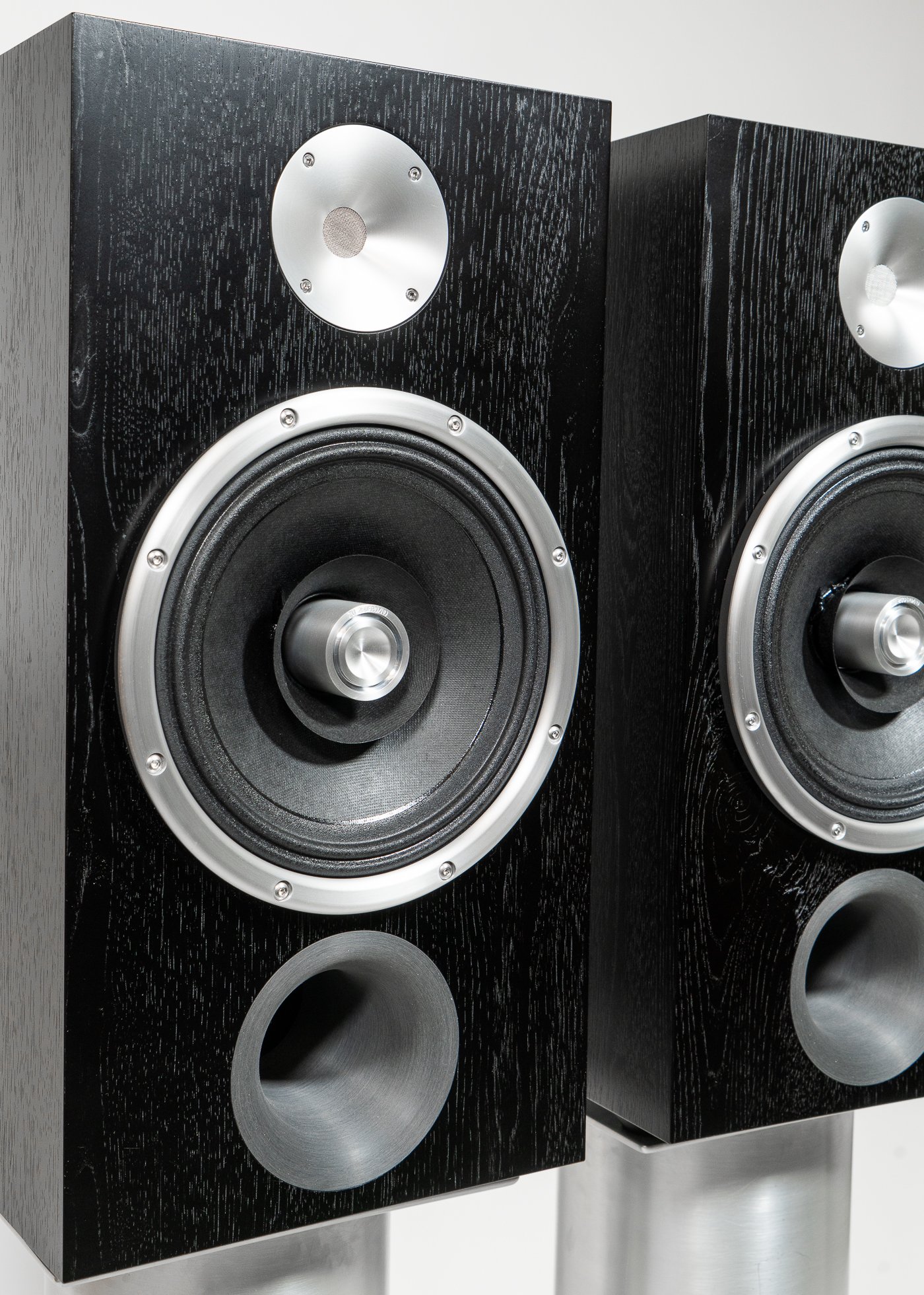 Isometric view - photo of Zu DWX (standard) finished in black dyed hickory, matched pair.