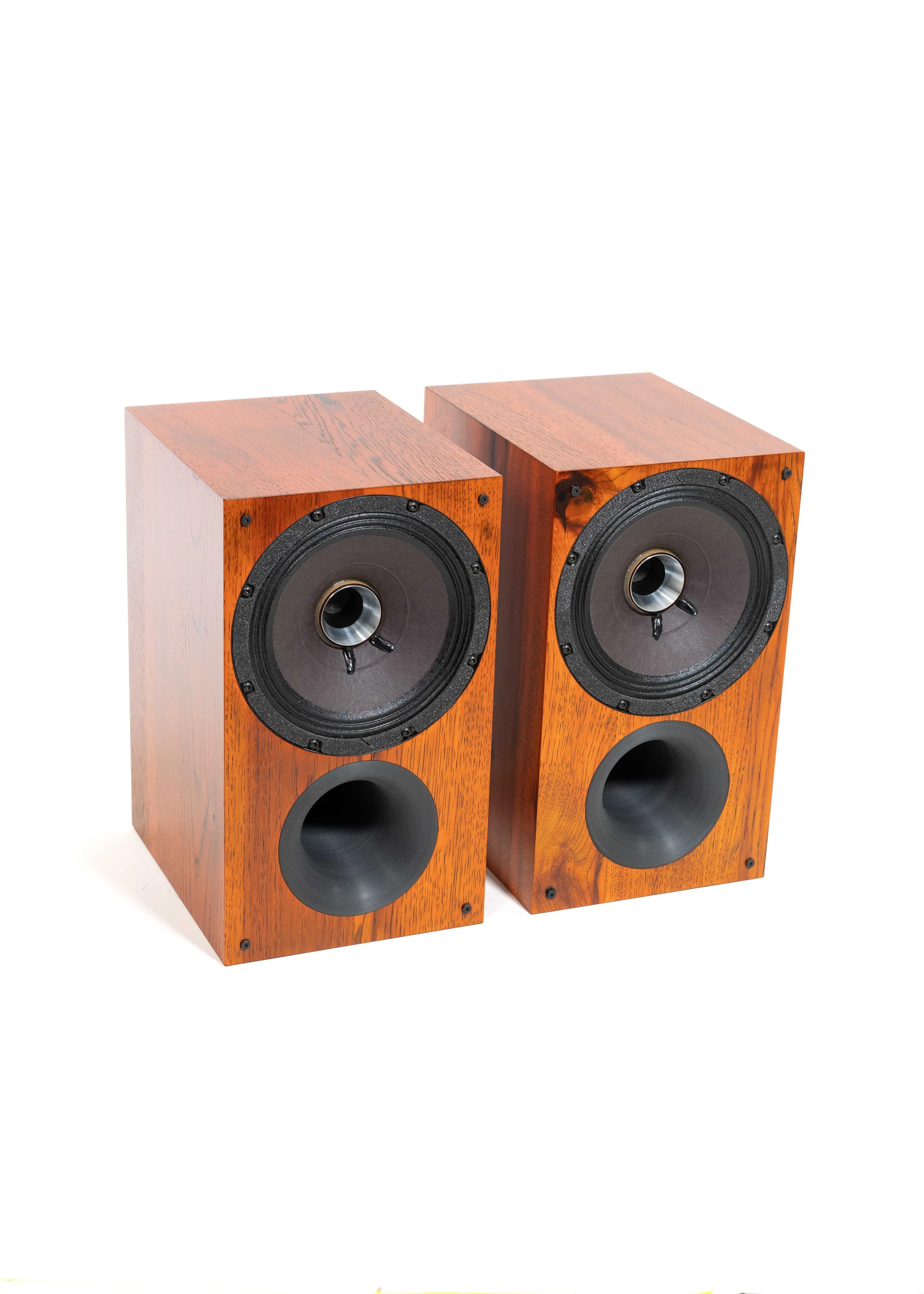 Photo of Zu Method Bookshelf pair finished in custom ember orange candy over rustic hickory.