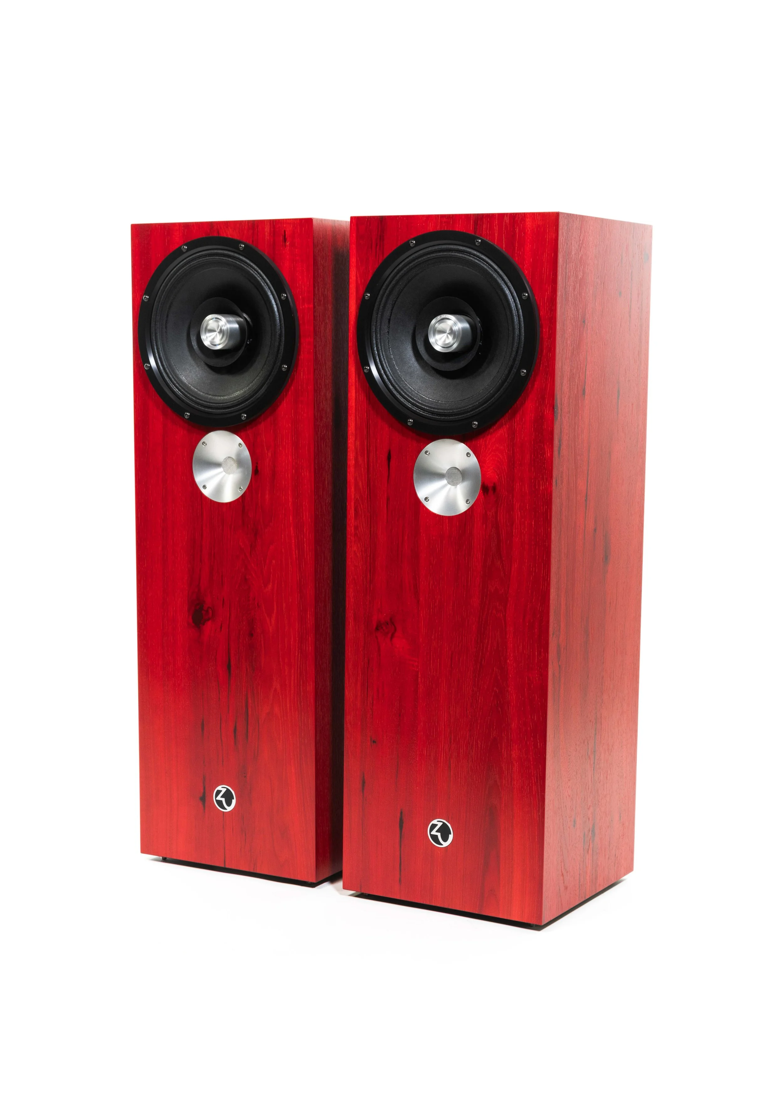 Isometric view photo of Zu DW-6 loudspeakers finished in ruby red hickory and feature black anodized trim-ring.