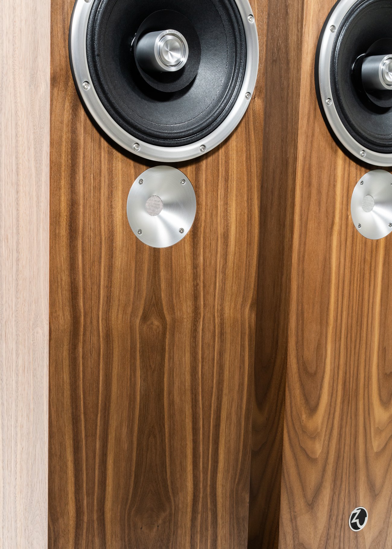 Isometric view closeup again photo of Zu Dirty Weekend Six loudspeaker finished in American walnut and silver machined aluminum trim - matched pair.
