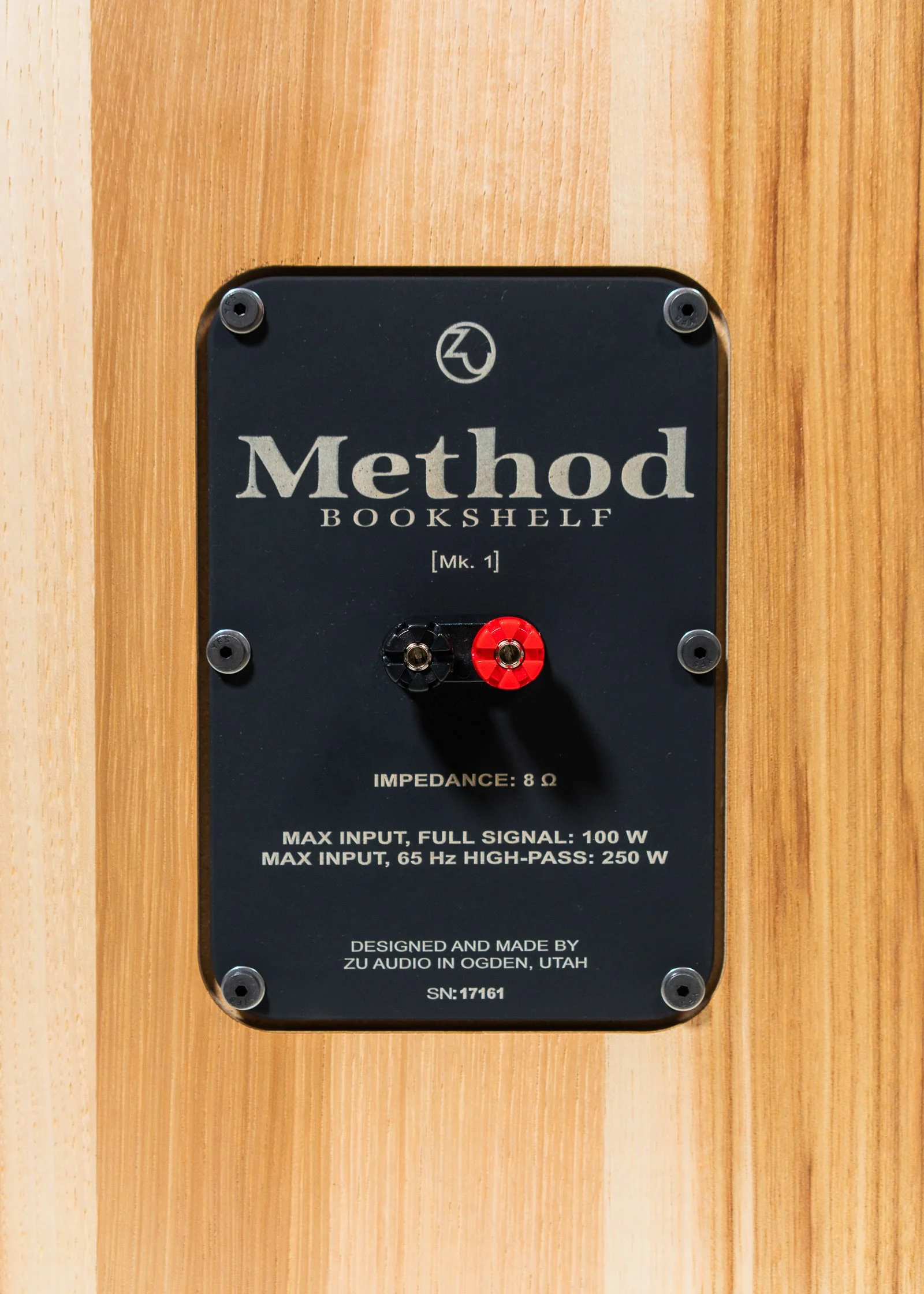 Closeup photo of Zu Method Bookshelf nameplate.