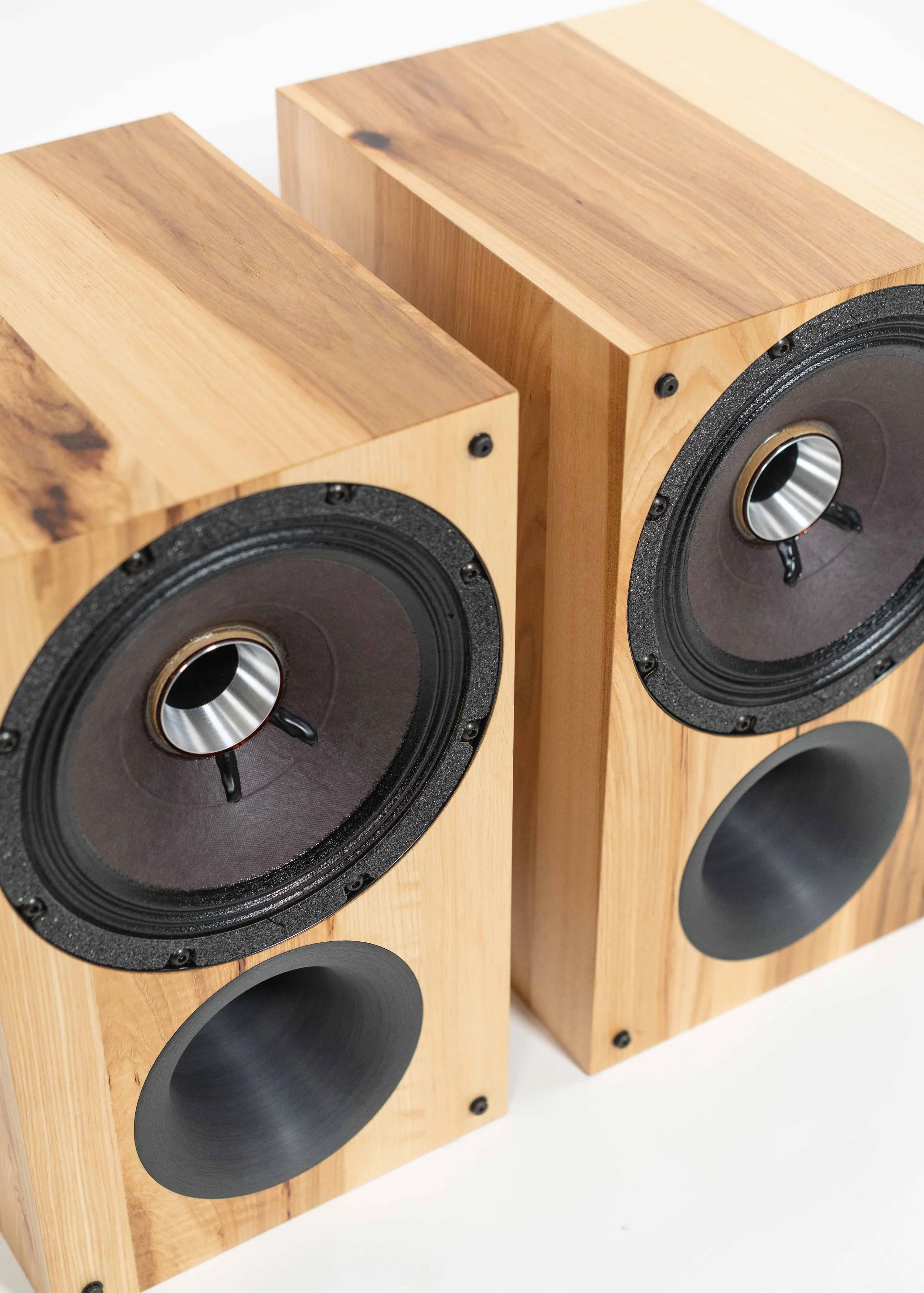 Closeup photo of Zu Audio Method Bookshelf speaker finished in rustic hickory.