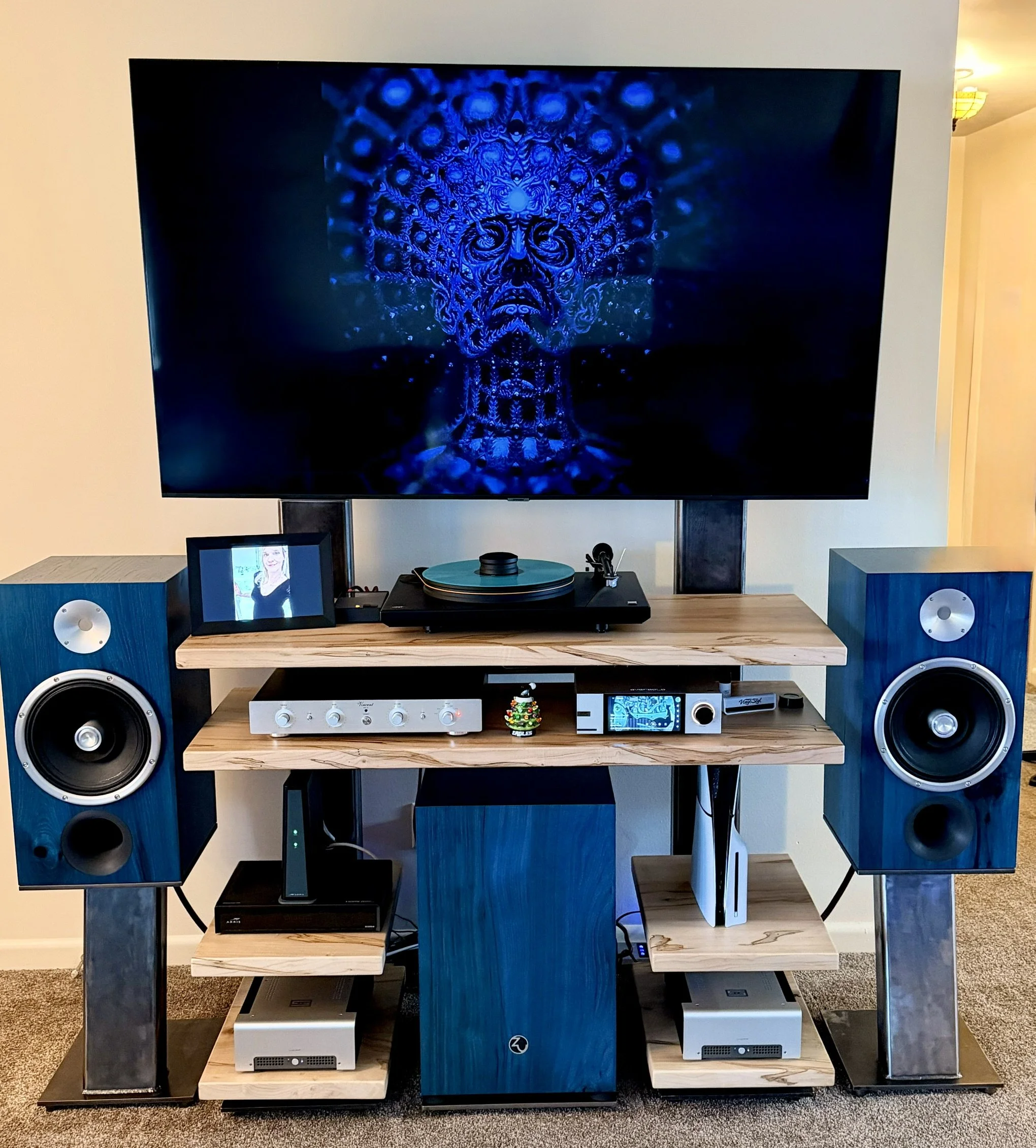 All of the steel work is welded and finished by me.  From the speaker stands to the floating shelves. The maple slabs were a tree in my backyard about 5 years ago.  Zu DWX with Jupiter capacitor upgrade, custom stands, Undertone 3, MoFi Ultradeck wit