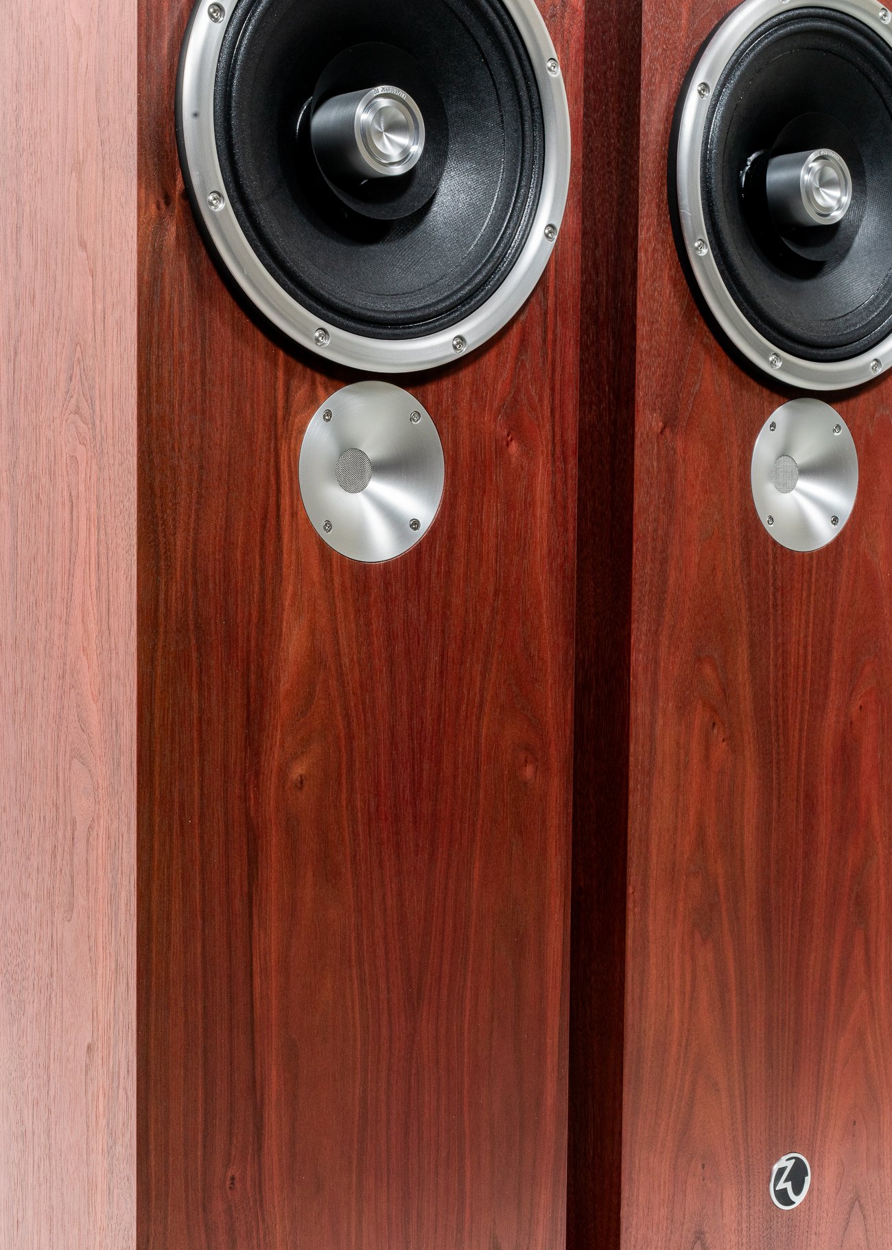 Closeup photo (isometric view) of Zu DW-6 Superfly in red-tone American walnut - matched pair.