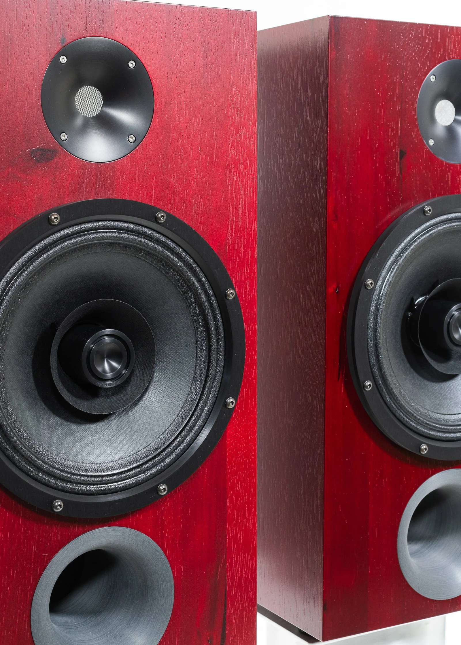 Alternate photo of Zu DWX loudspeakers finished in ruby red hickory and trimmed in black anodized hardware.