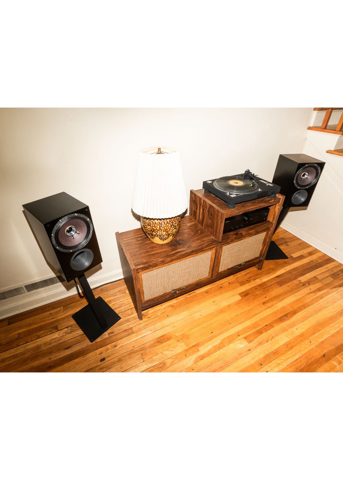 Photo of Zu Method Bookshelf speakers finished in black satin shown in-room.
