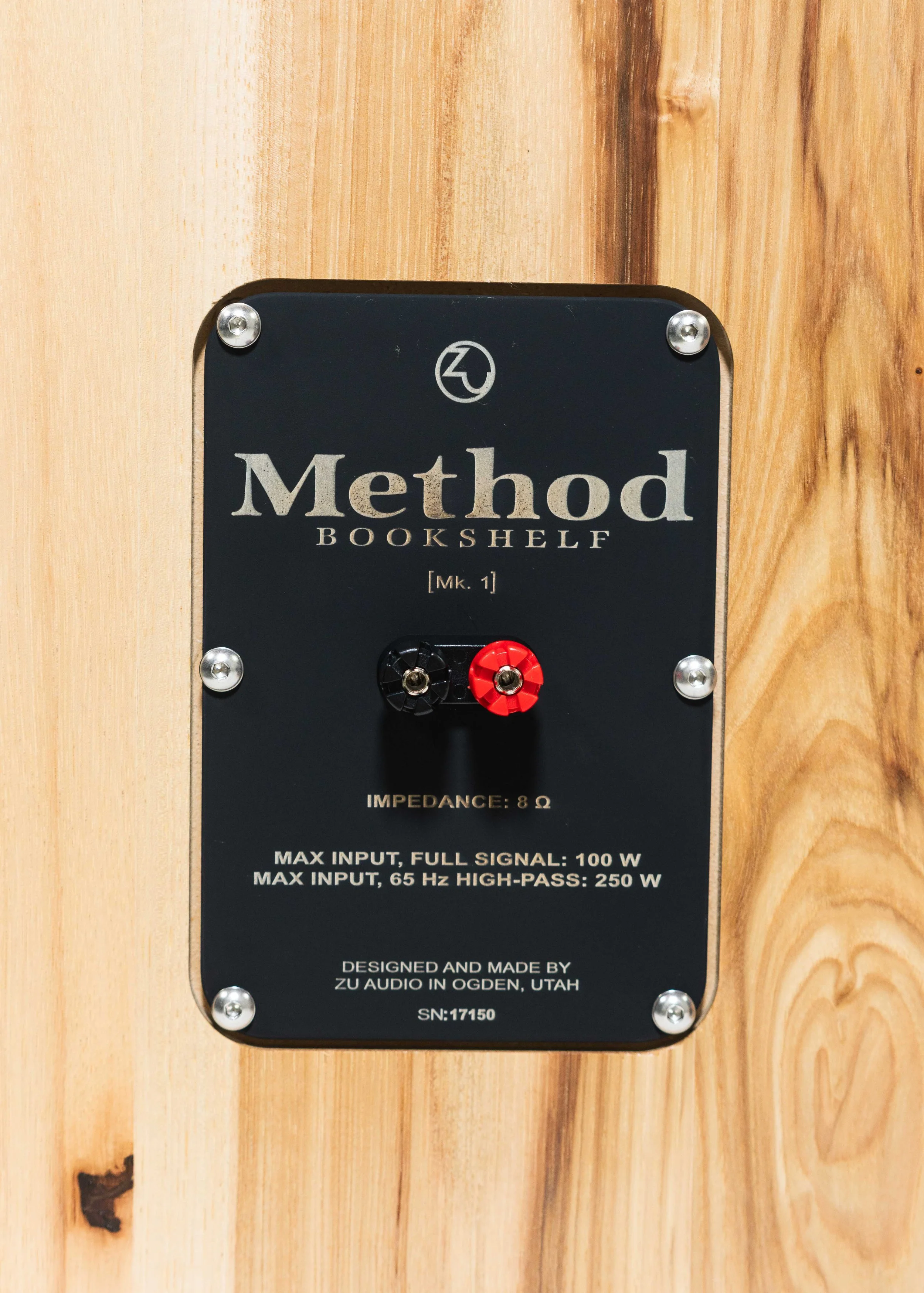 Closeup photo of Zu Method Bookshelf loudspeaker nameplate and binding posts.