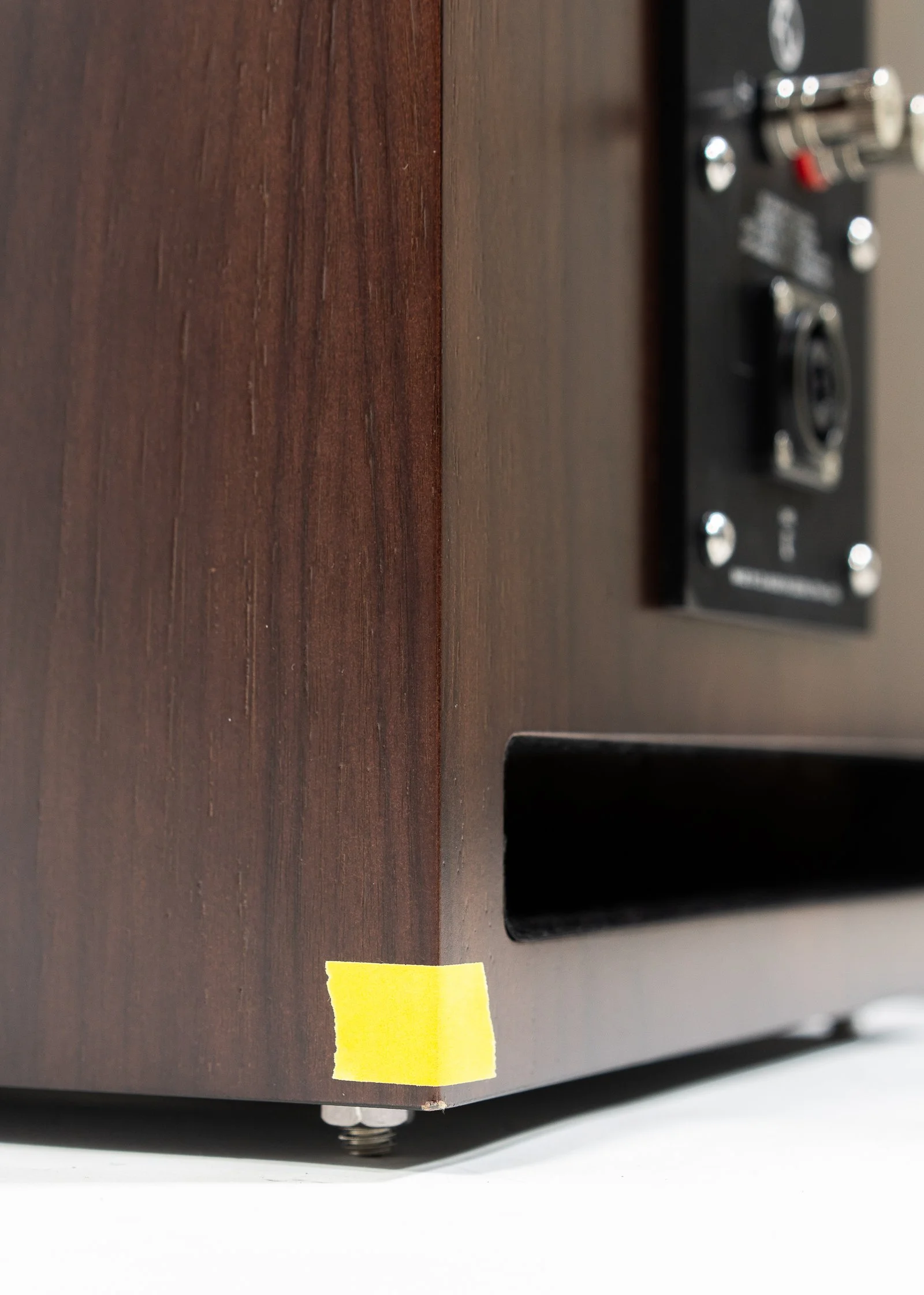 Closeup photo of Zu Union Six loudspeakers finished in dark brown American walnut.