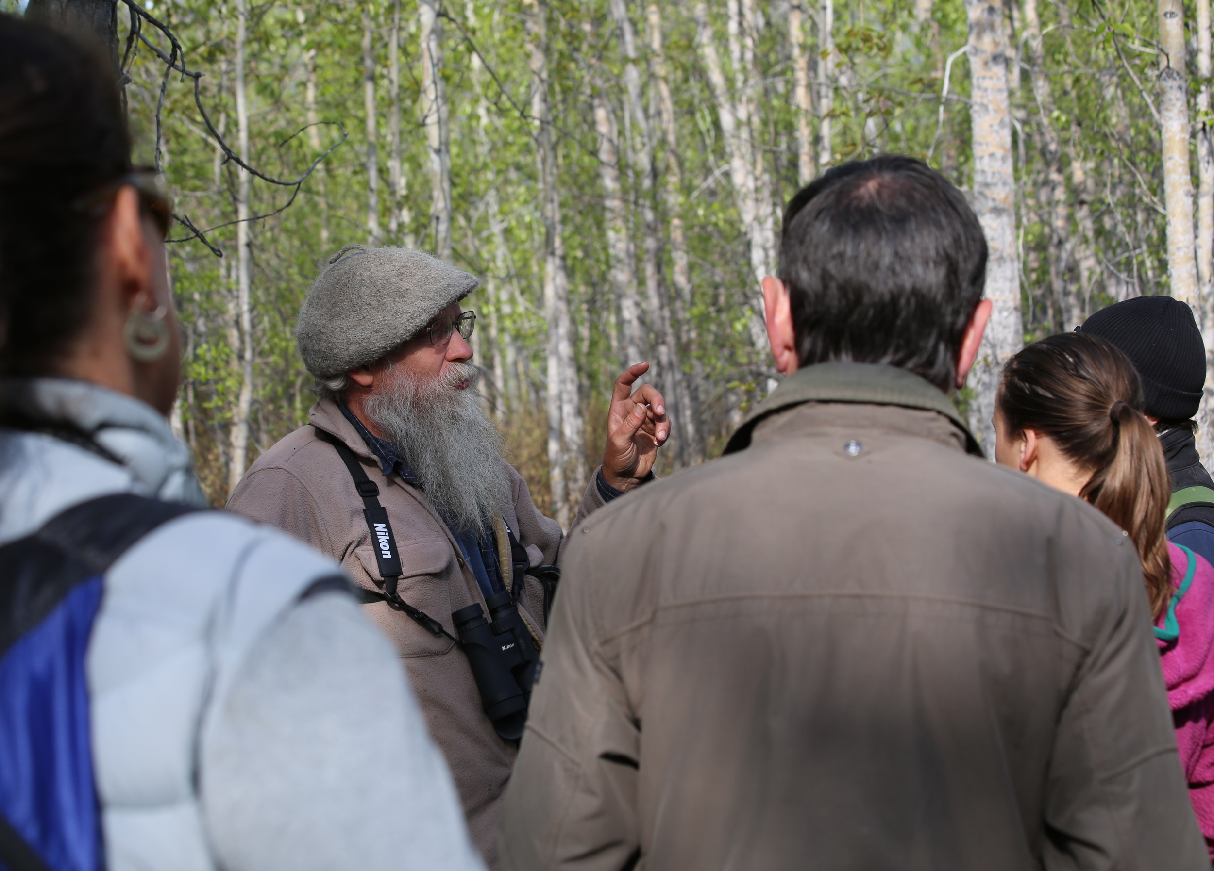 Mark Vail teaching the group about spring migrations, bird habits, and habitats. Photo by Leanne Phelps