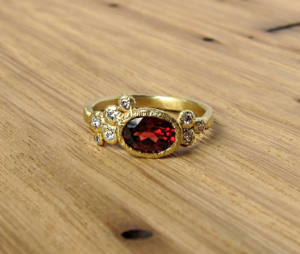 18k Gold, Mozambique Garnet & Round Brilliant Diamond Accents. Sizable from 5-9 and half sizes too.