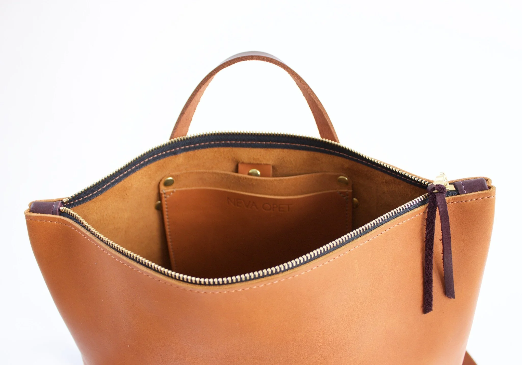 zip top leather backpack