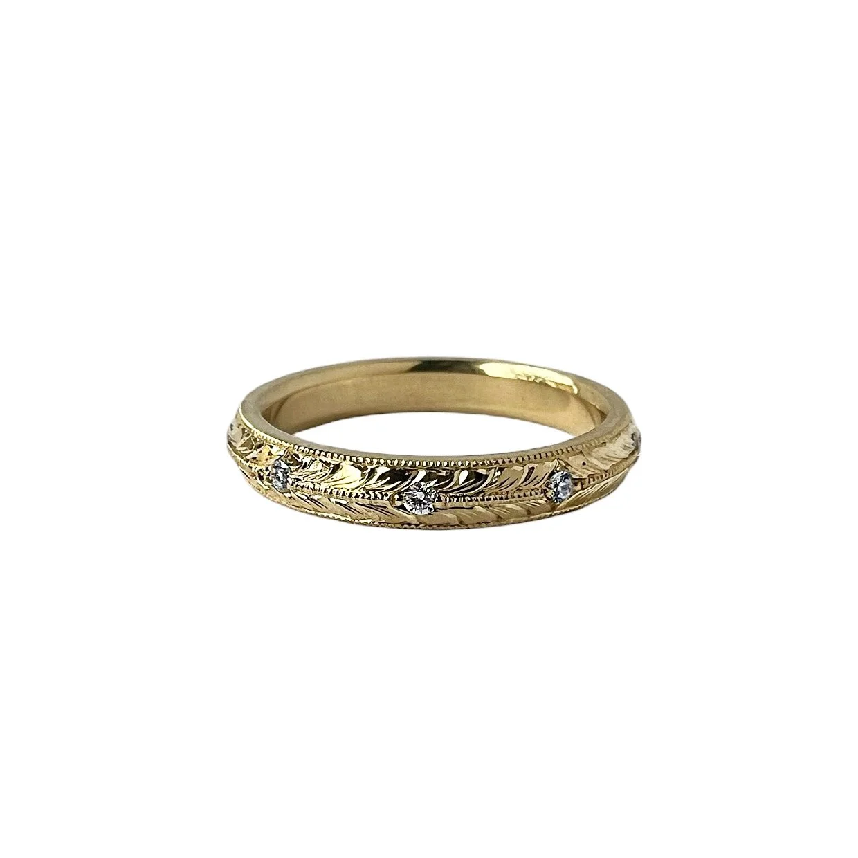 Banno-Hand-Engraved-Wedding-Band.JPG