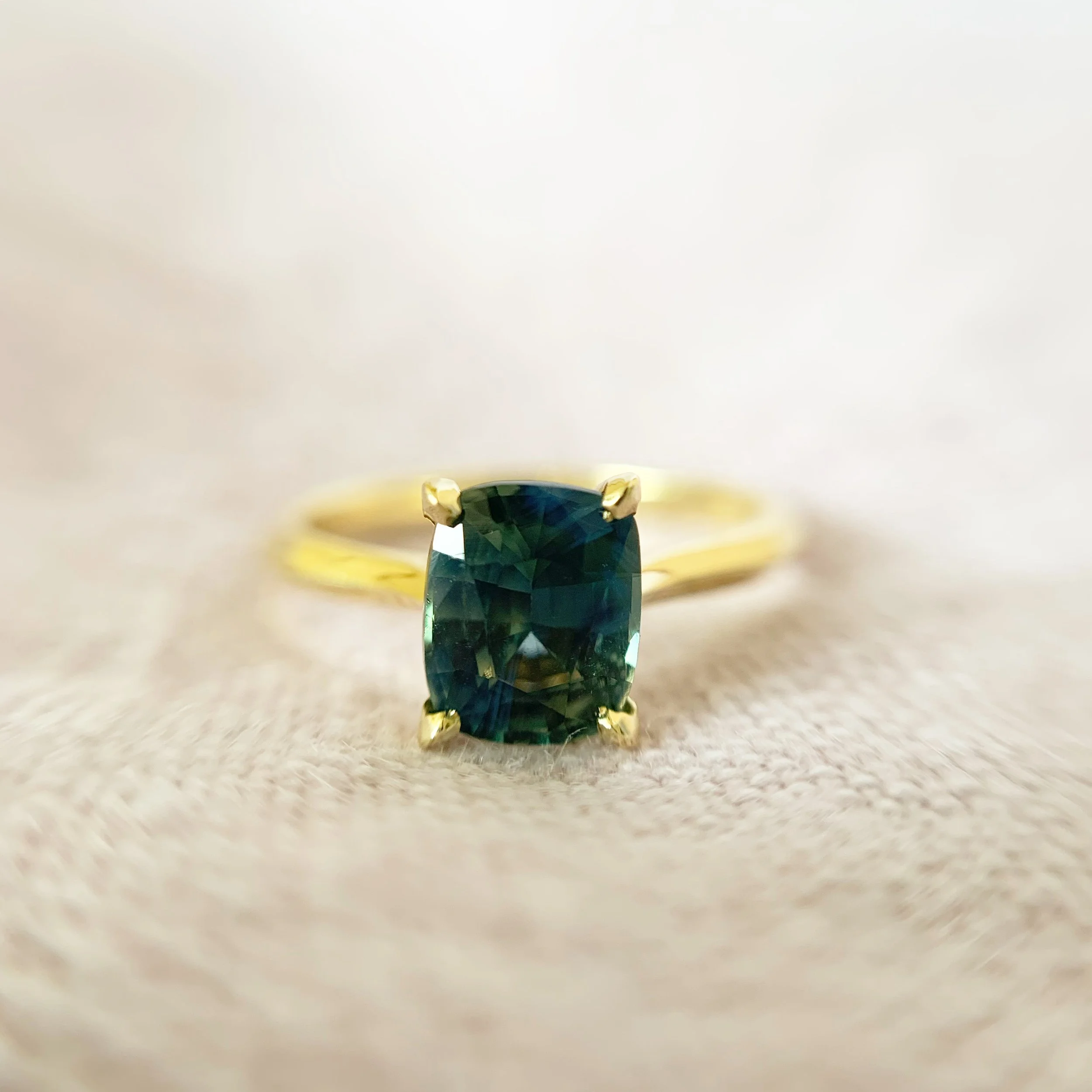 Cushion-Cut-teal-sapphire-ring.JPG