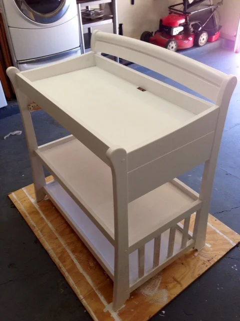 This is before the 2nd coat on the bottom shelves spindles.