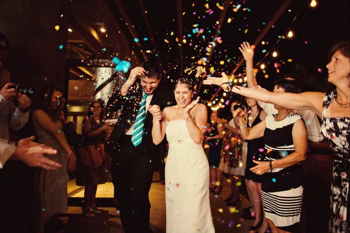 Exiting the reception to confetti eggs