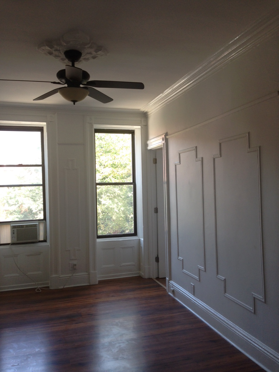 Opposite wall from fireplace in master bedroom. Door at back right leads into nursery. 
