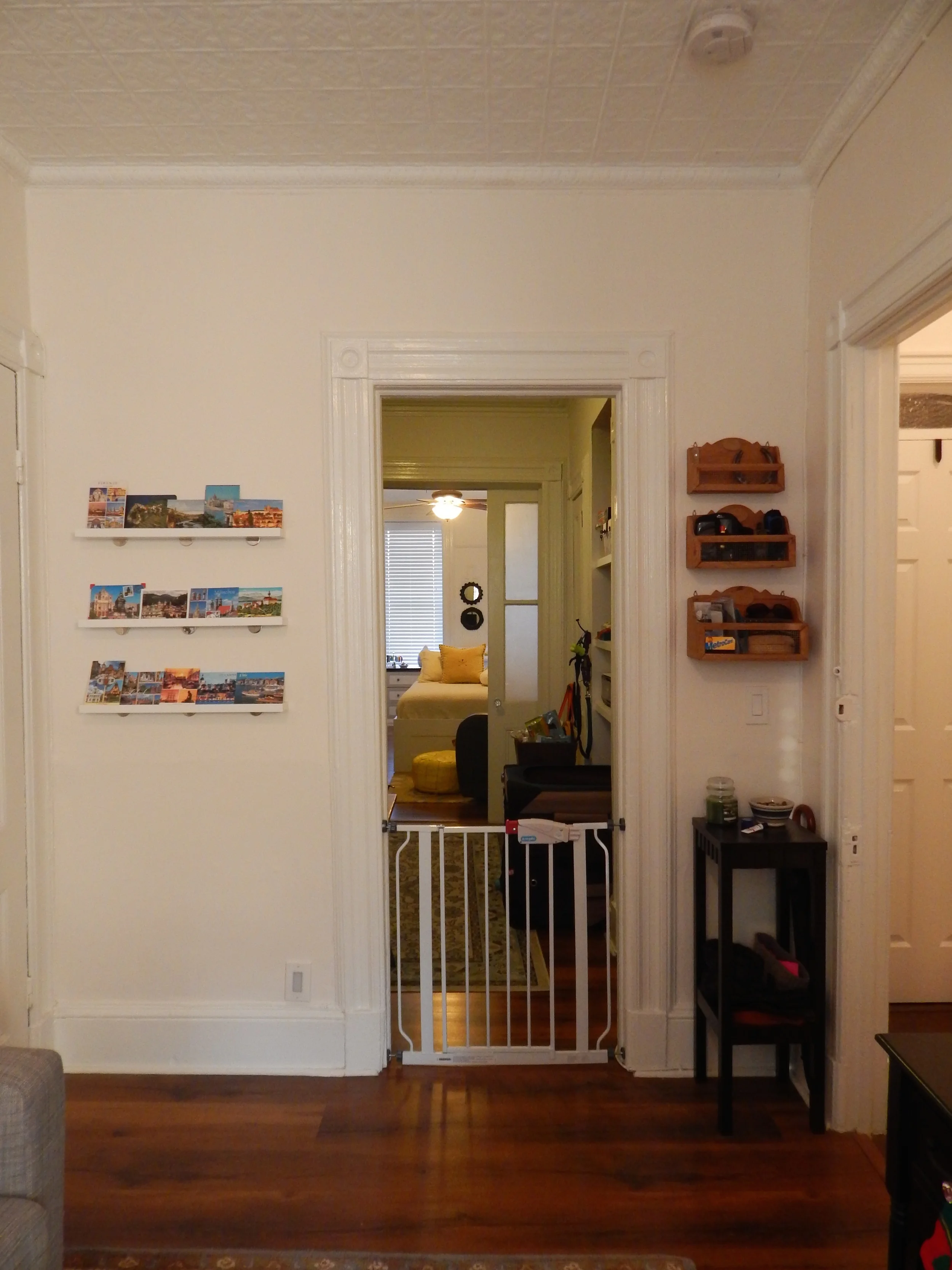 View of our office and into the bedroom from the living room. Baby gate just serves as early prep for Aurora. 