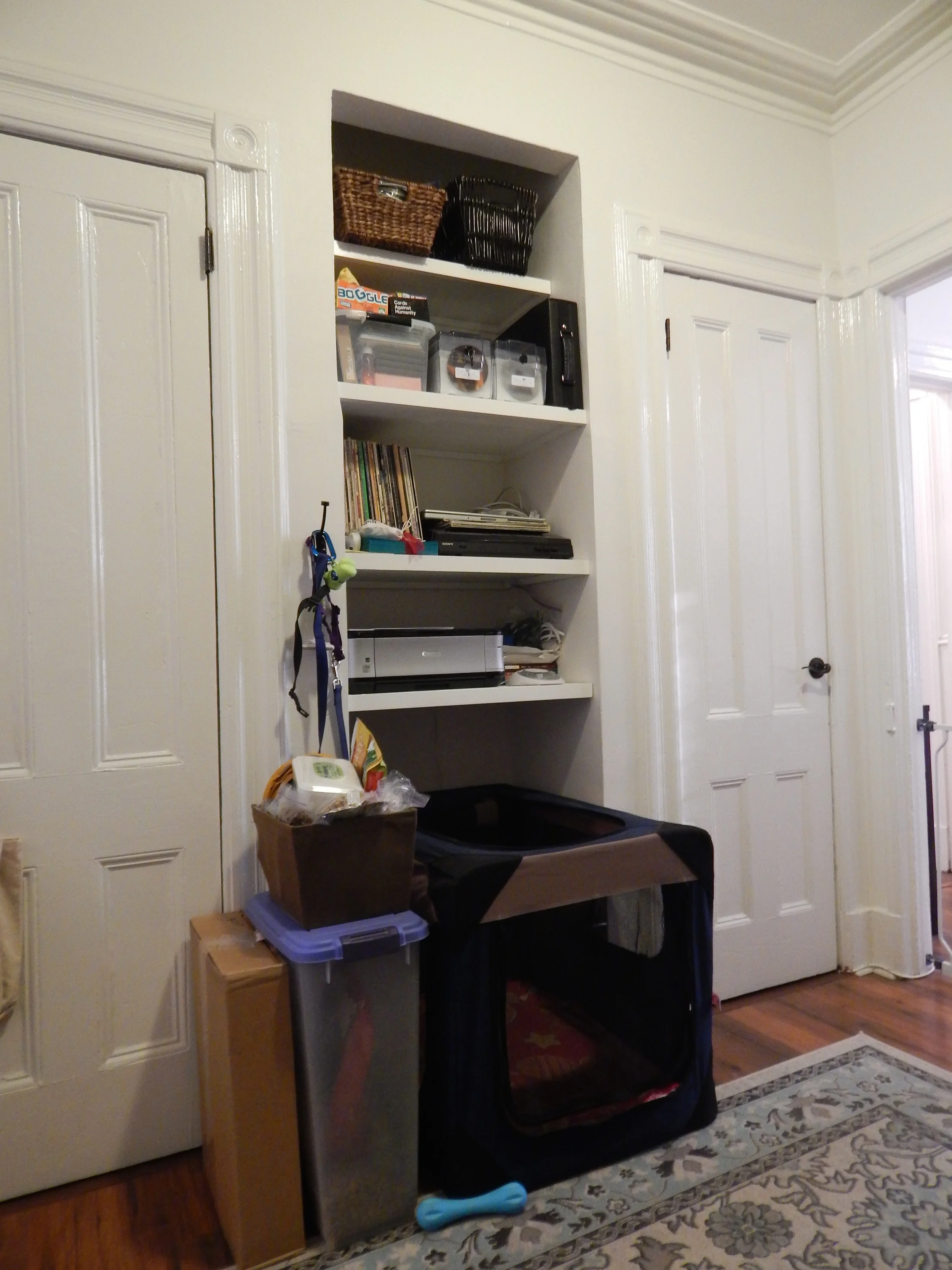 Opposite wall of our office - Aurora's bed / crate sits between our closets. 