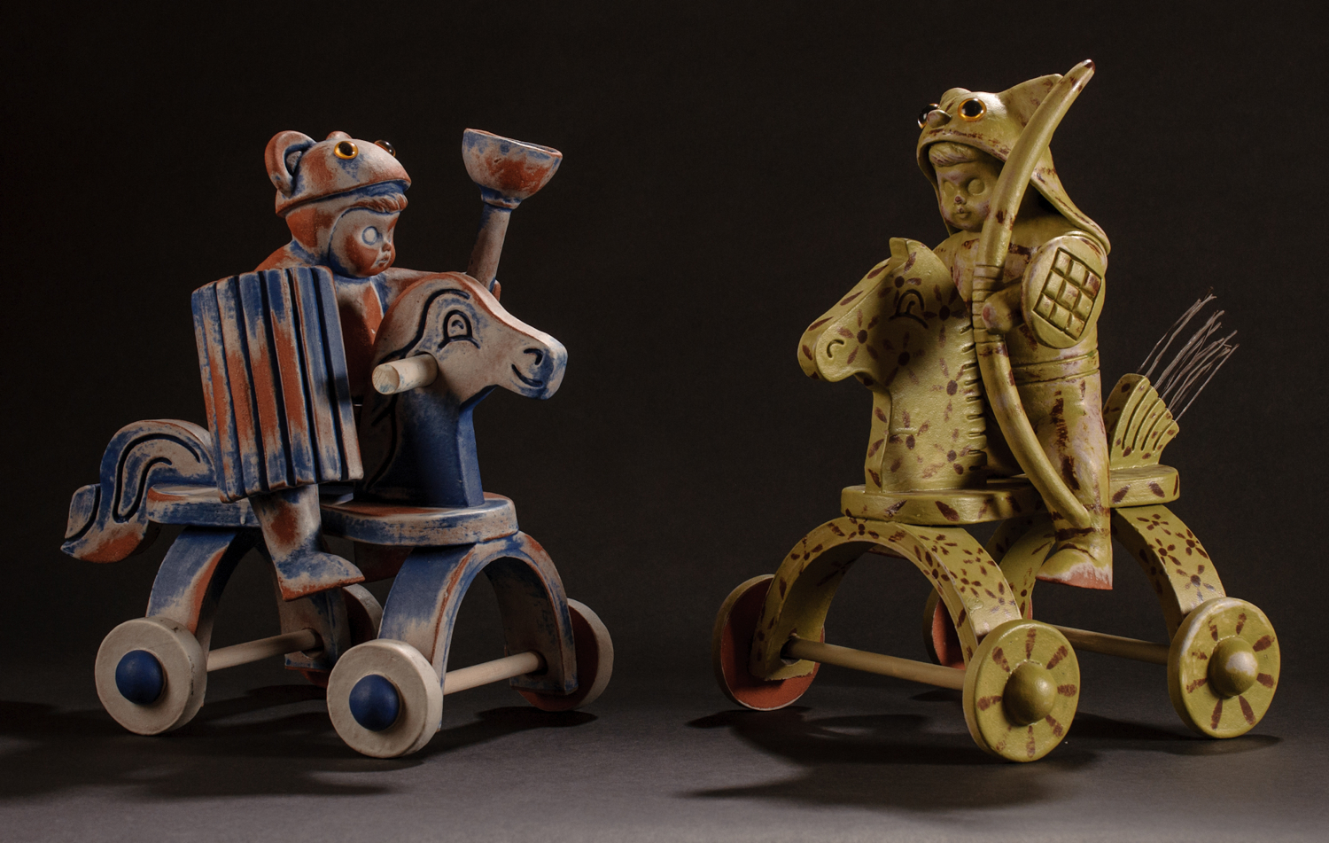 2 Mounted Warriors (Blue Bear & Green Kitty), glazed & stained terra cotta, acrylic eyes, broom straws, 13”h X 9”w X 12”d (each), 2011