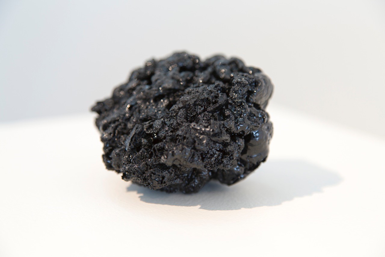 Oddity, torched black record vinyl, 3.5"x3"x2", 2014