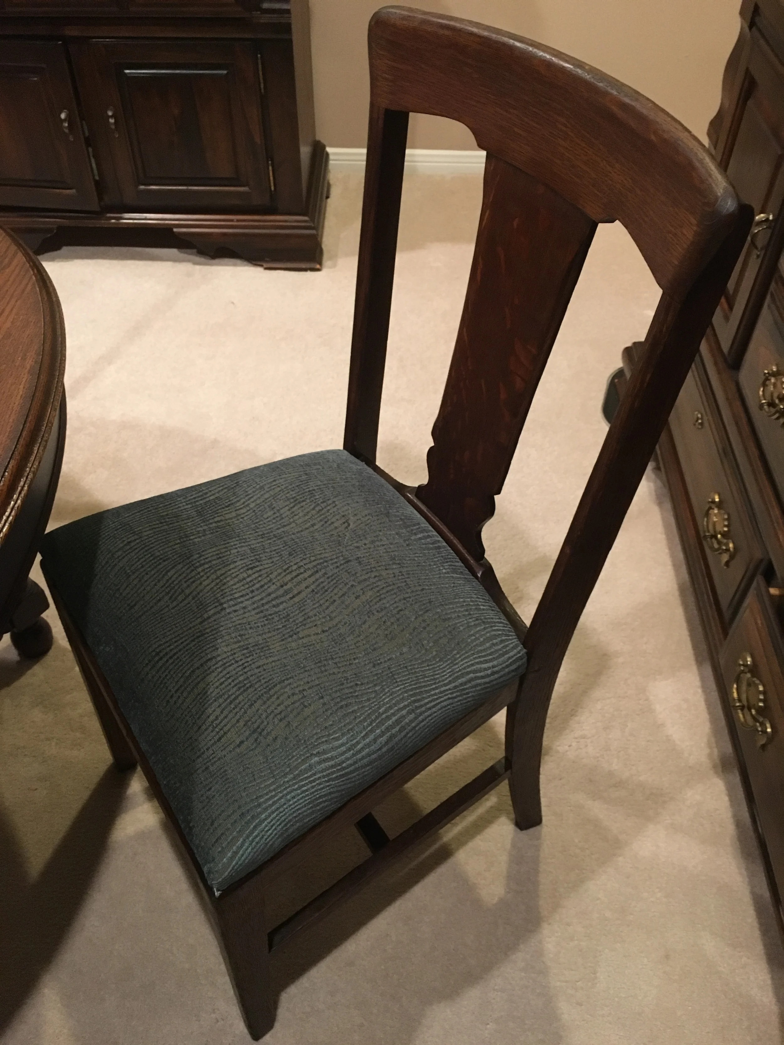 Reupholstered and refinished antique chair